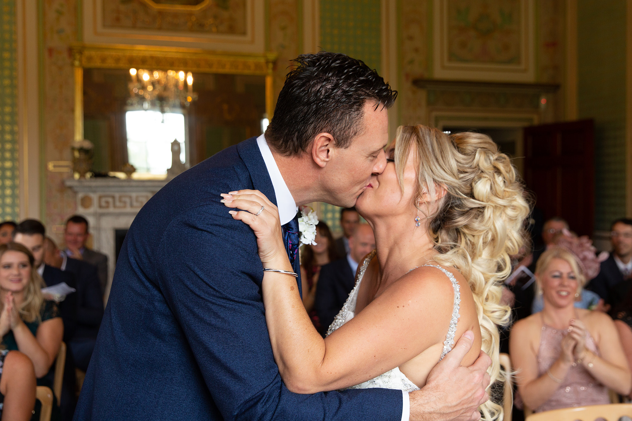 The bride and groom have their first kiss as husband and wife