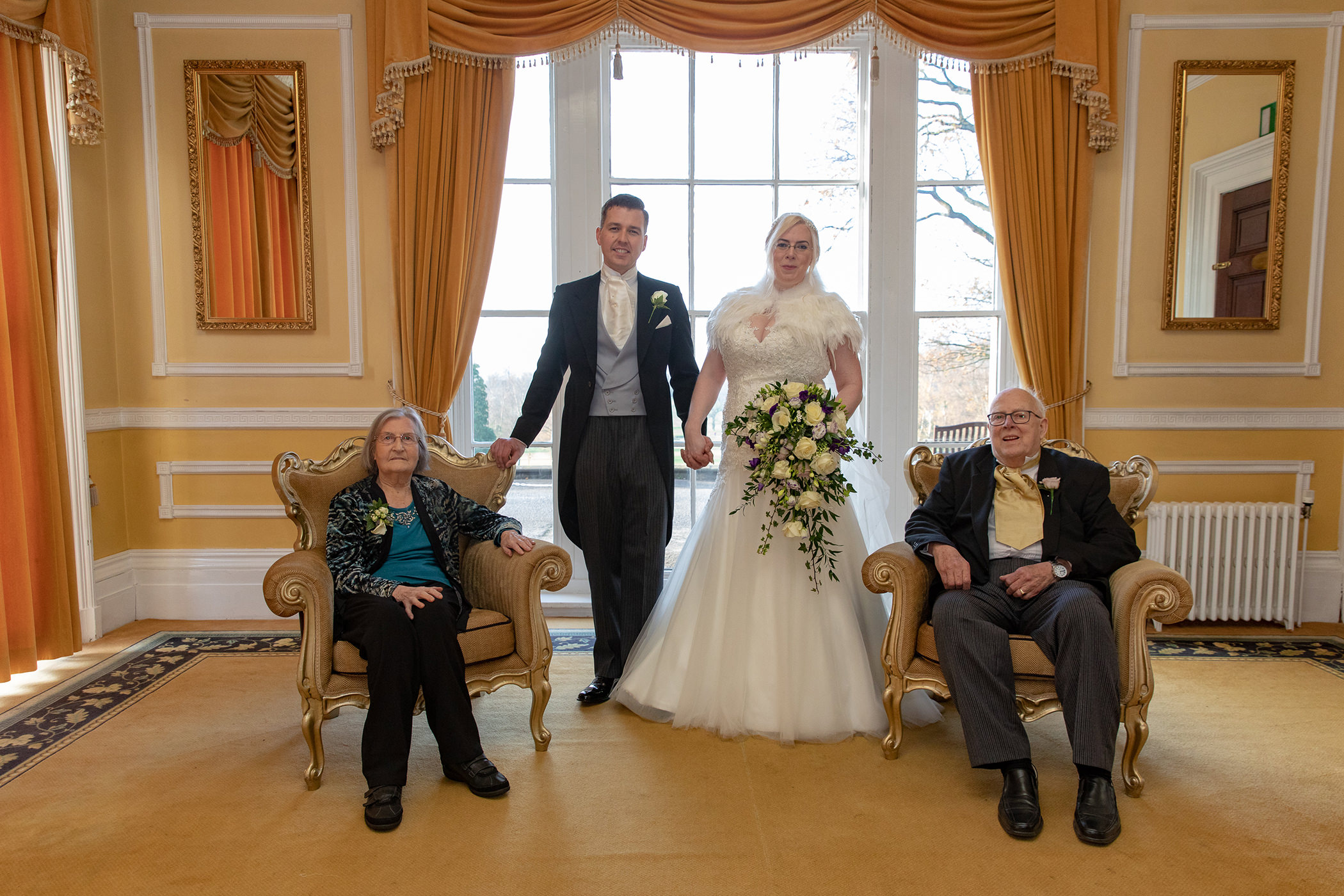 formal wedding photos in the ceremony room