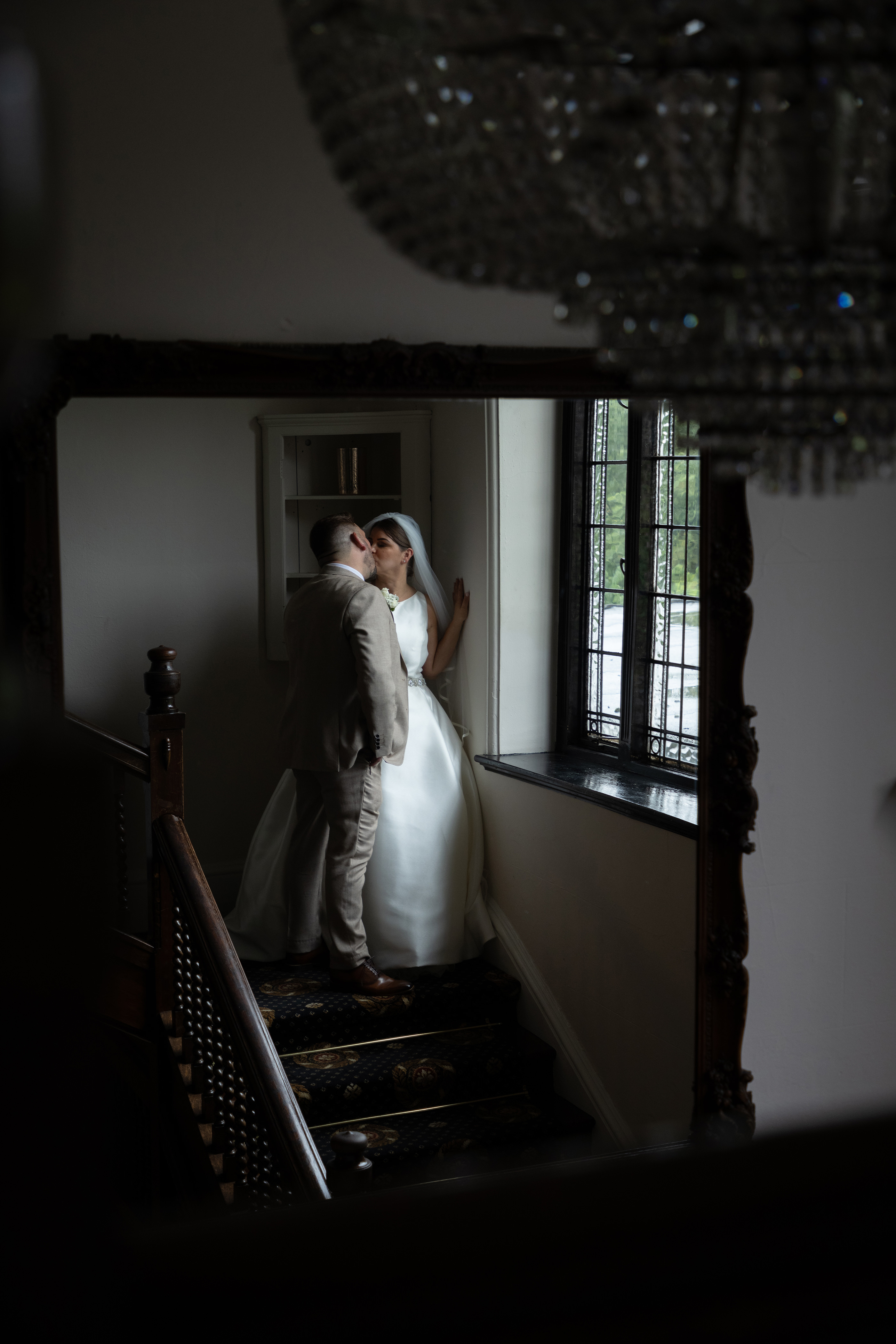 Wedding reflections in the mirror at Bartle Hall 