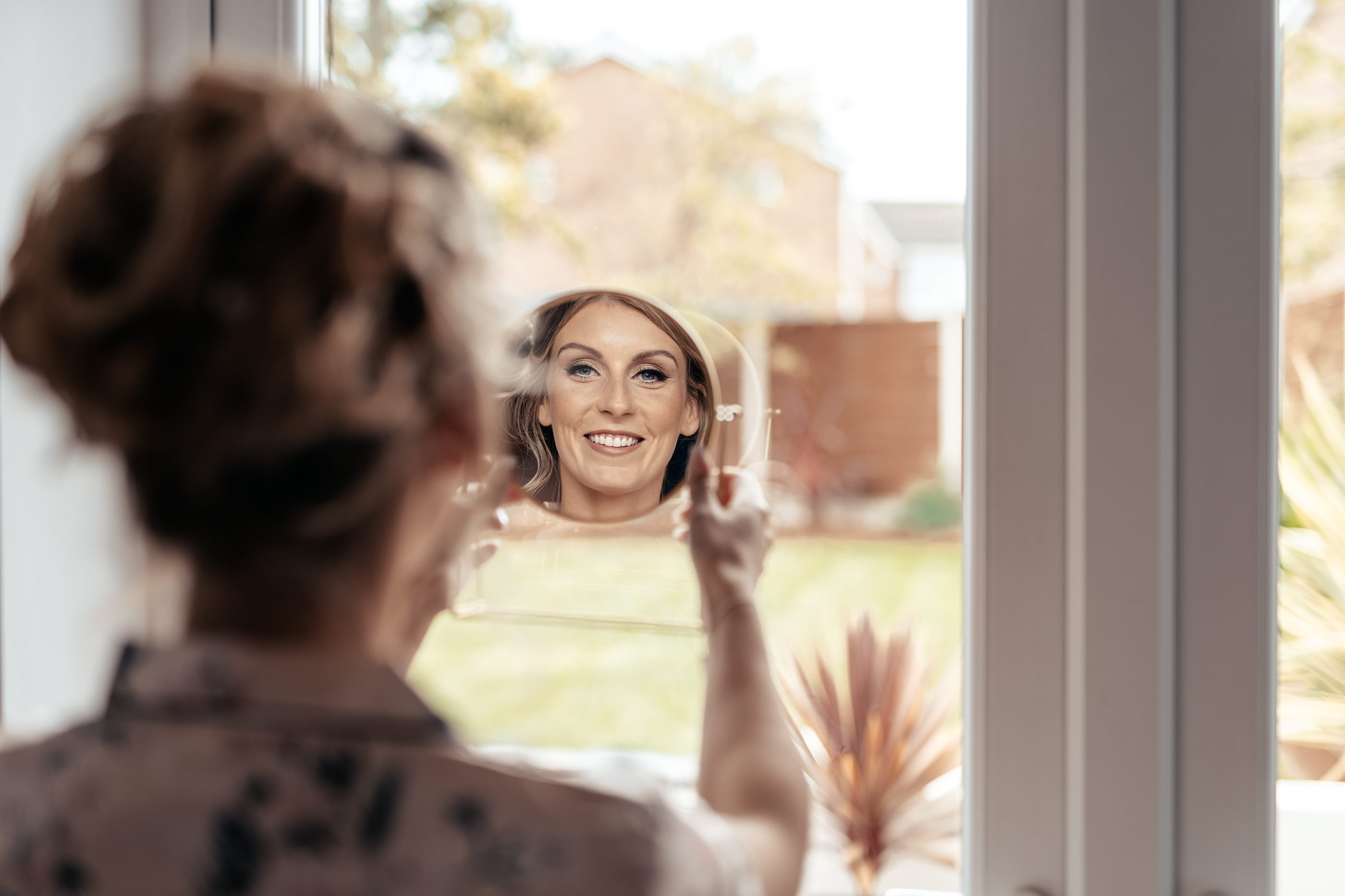 The Brides reflection in the mirror 