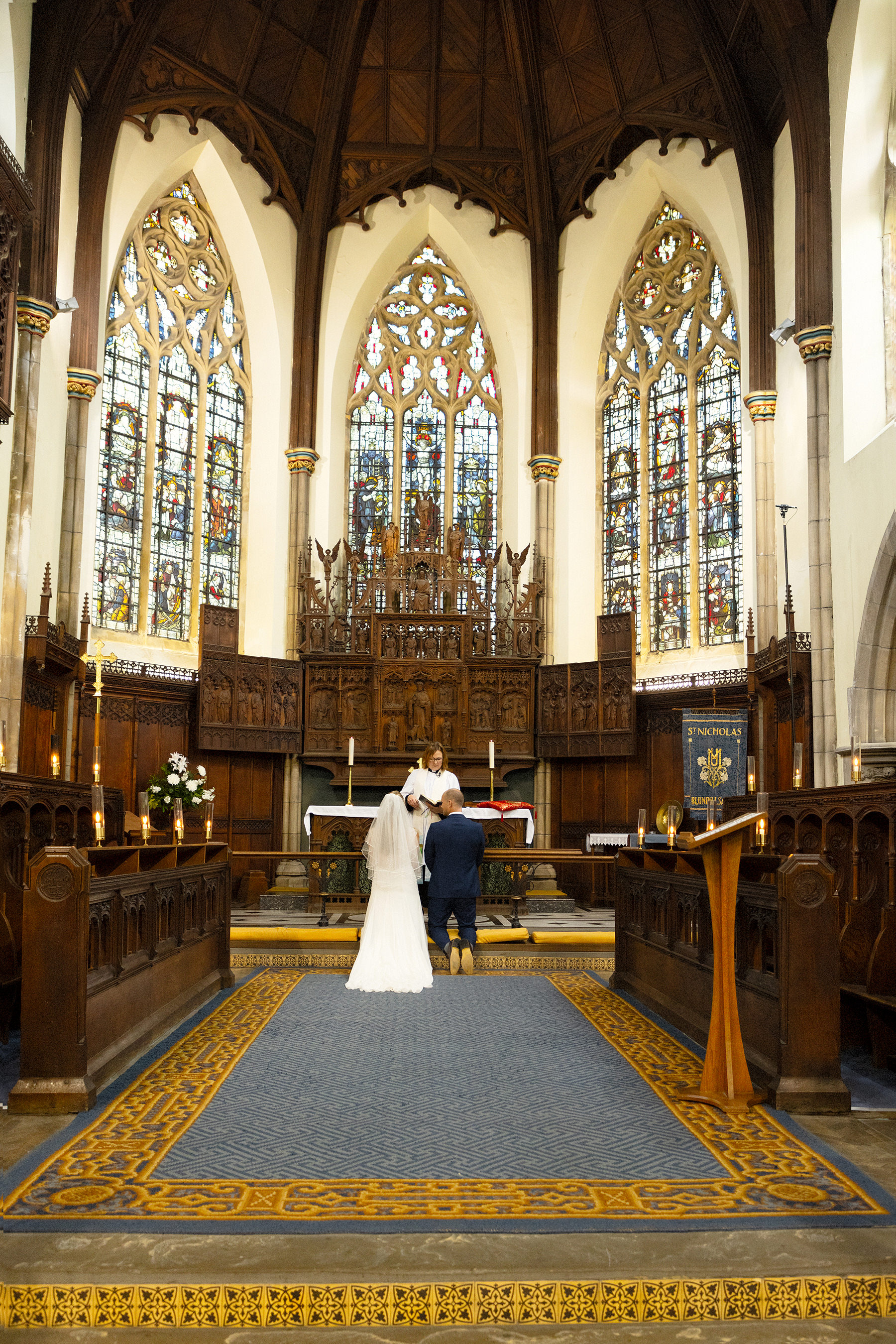 the bride and groom in the church