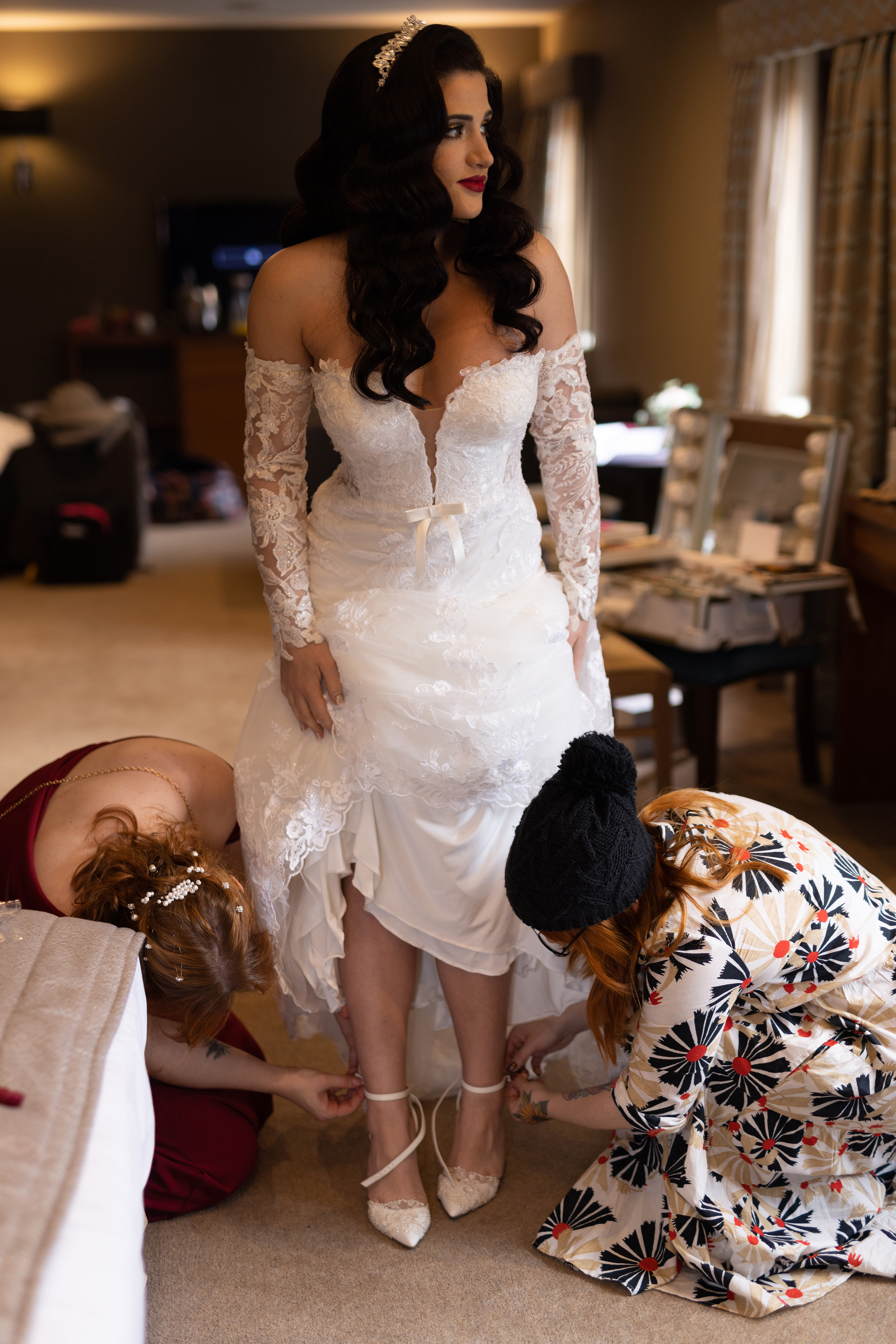  putting on the bridal shoes