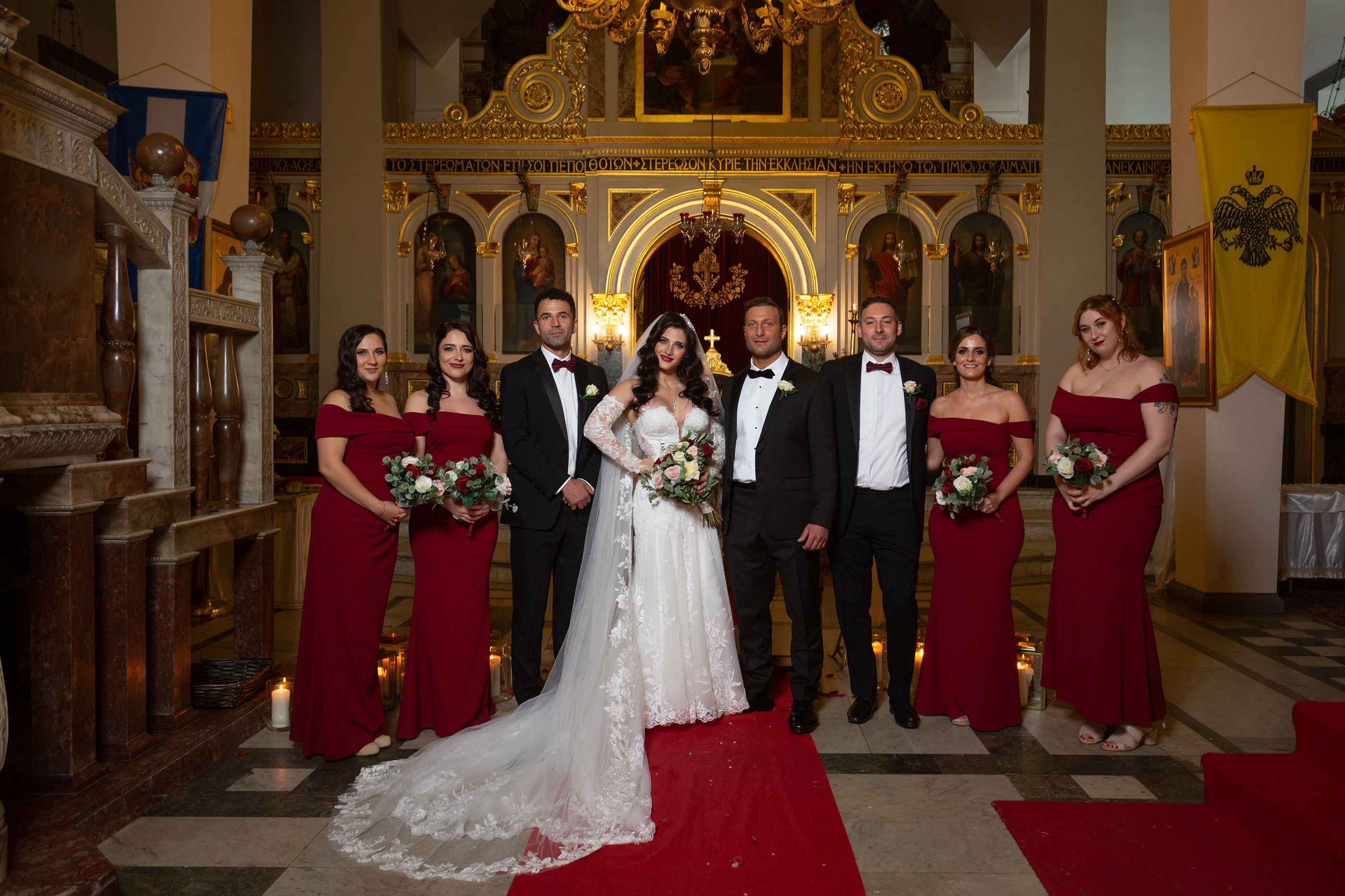  the bride and groom with bridesmaids and best man