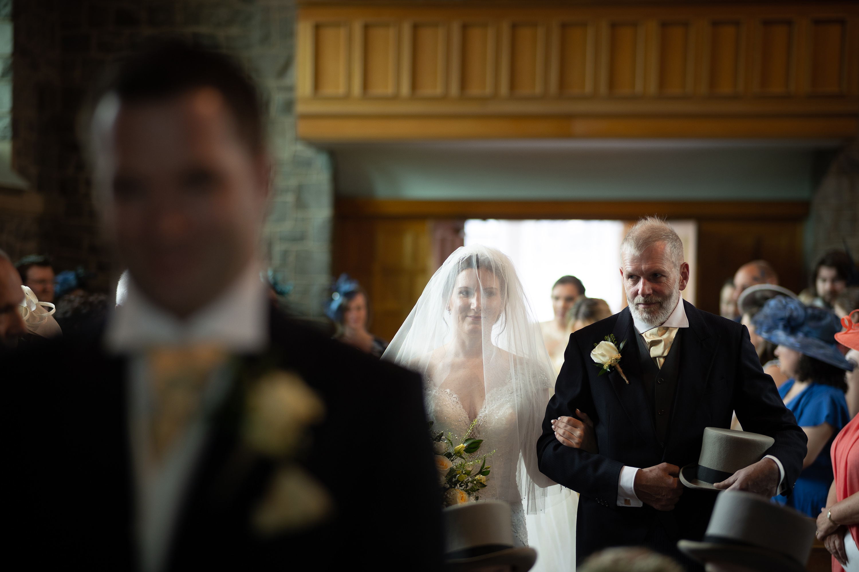 The Bride chain and her father walking down the aisle 