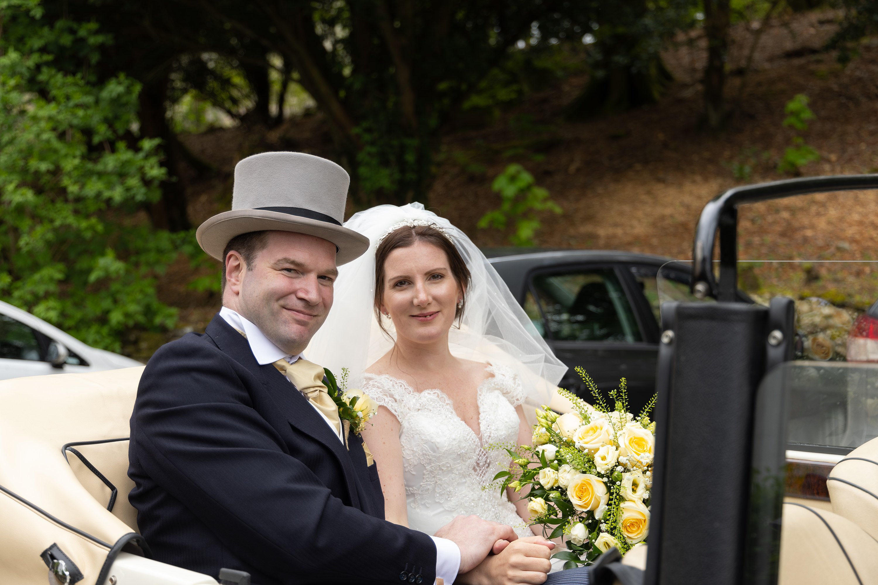 The bride and groom arrive at the wedding reception 