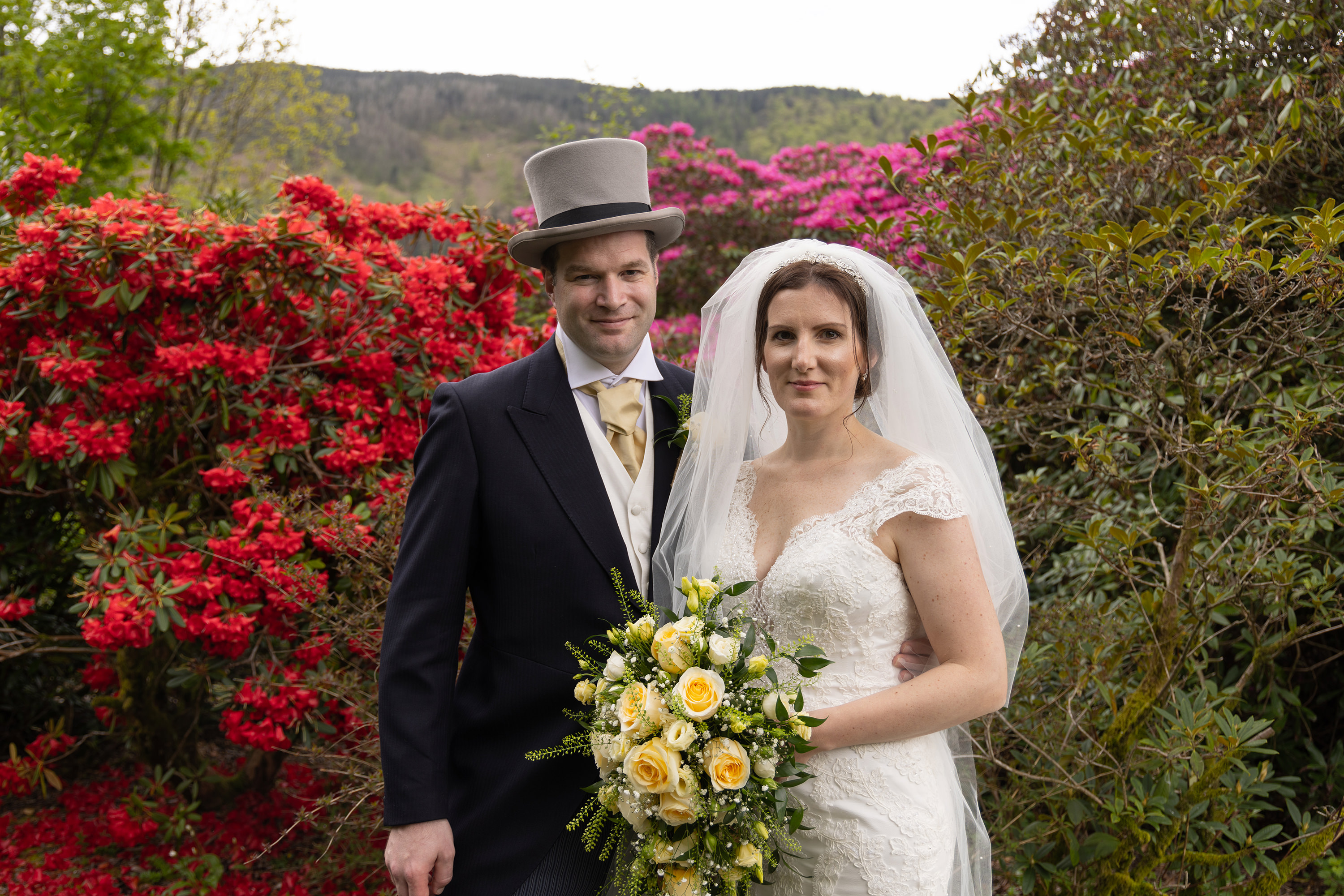 Jane and Dale in the gardens having their photo taken 