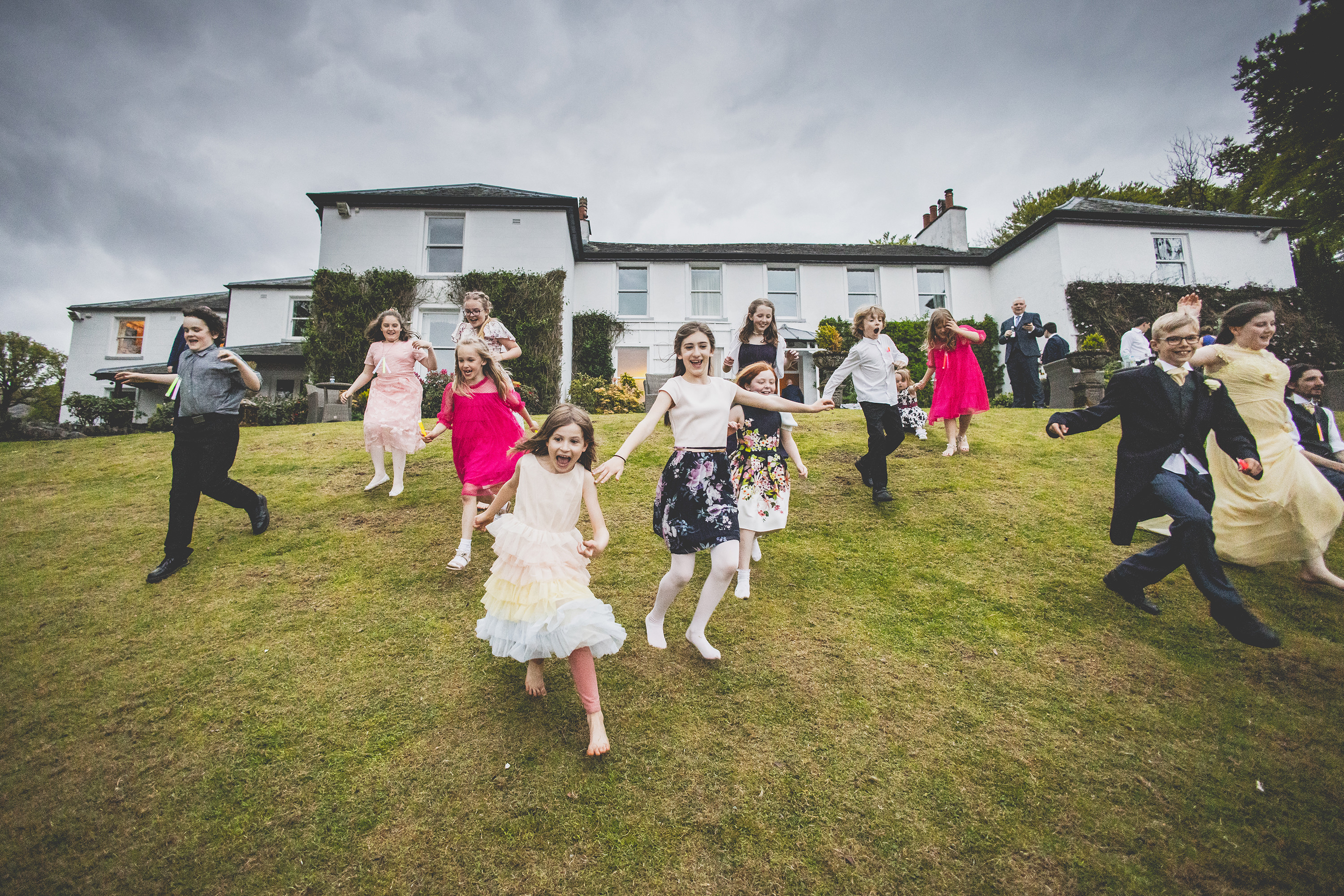 Children running down the hill 