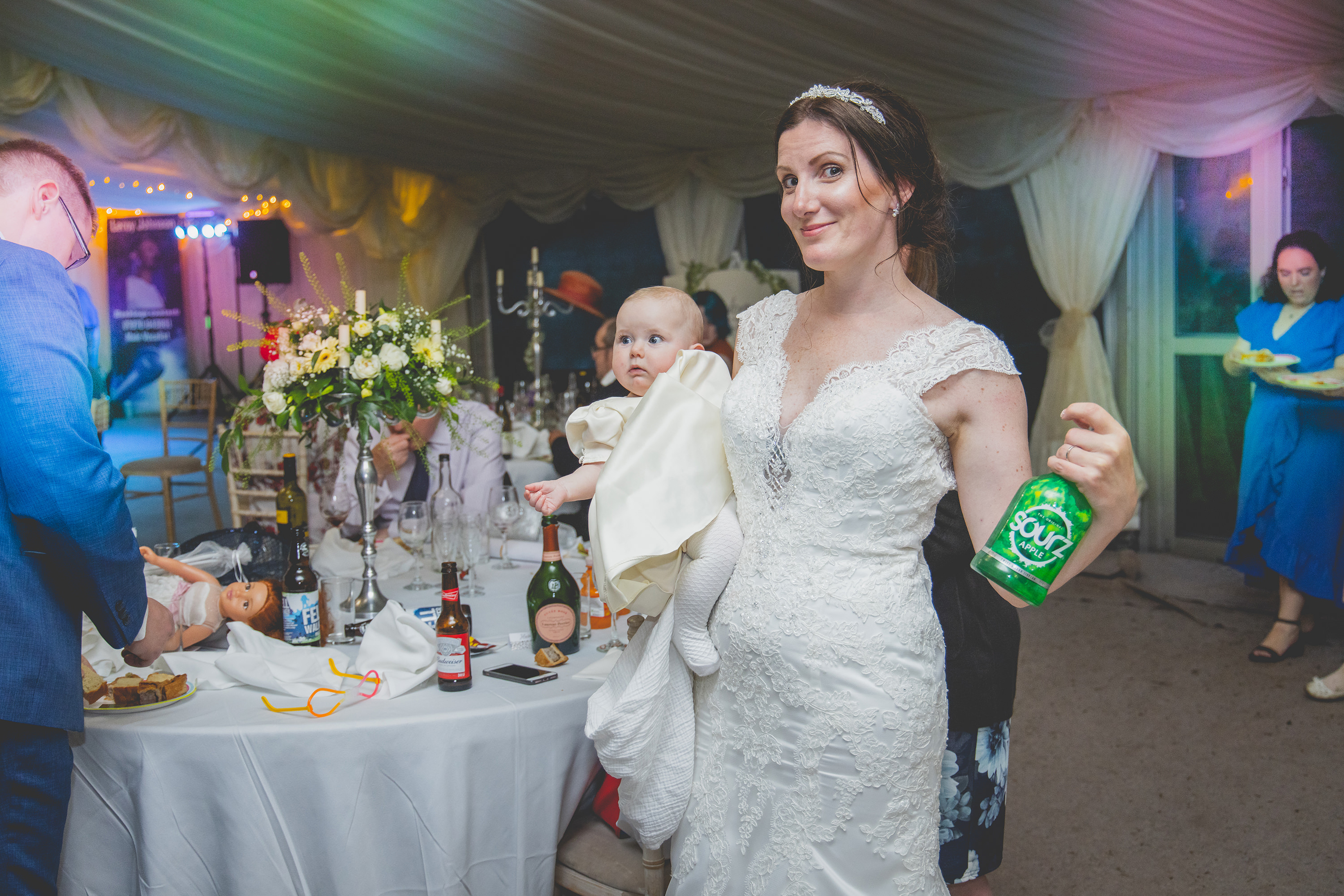 The Bride having a drink with her baby 