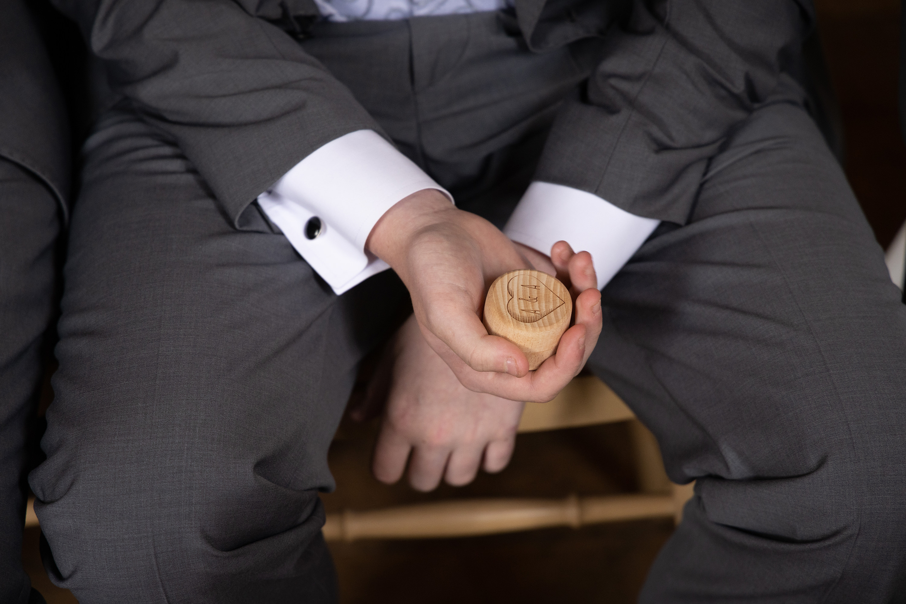 The best man holding the wedding rings