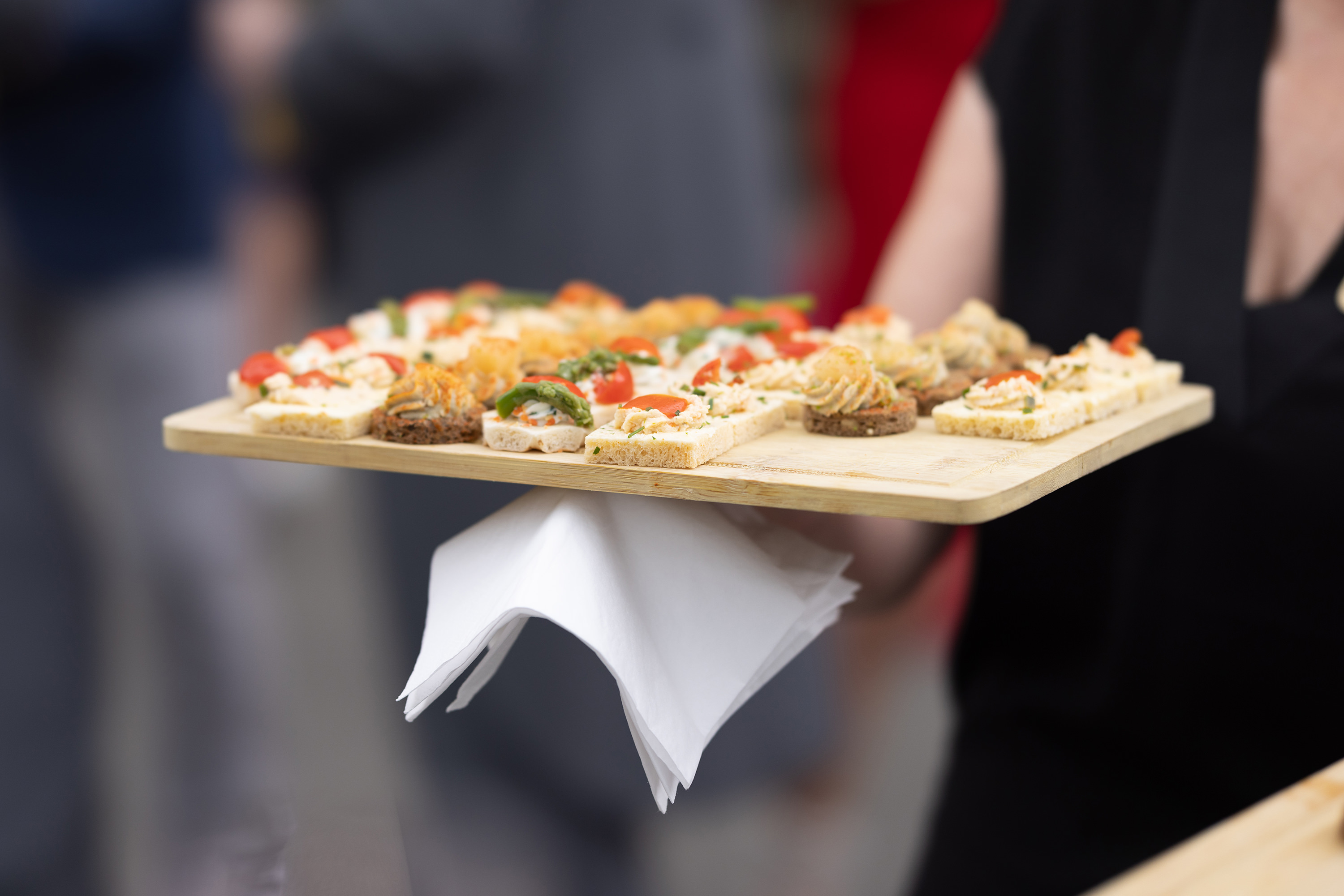 The canapes a handed round to the wedding guests 
