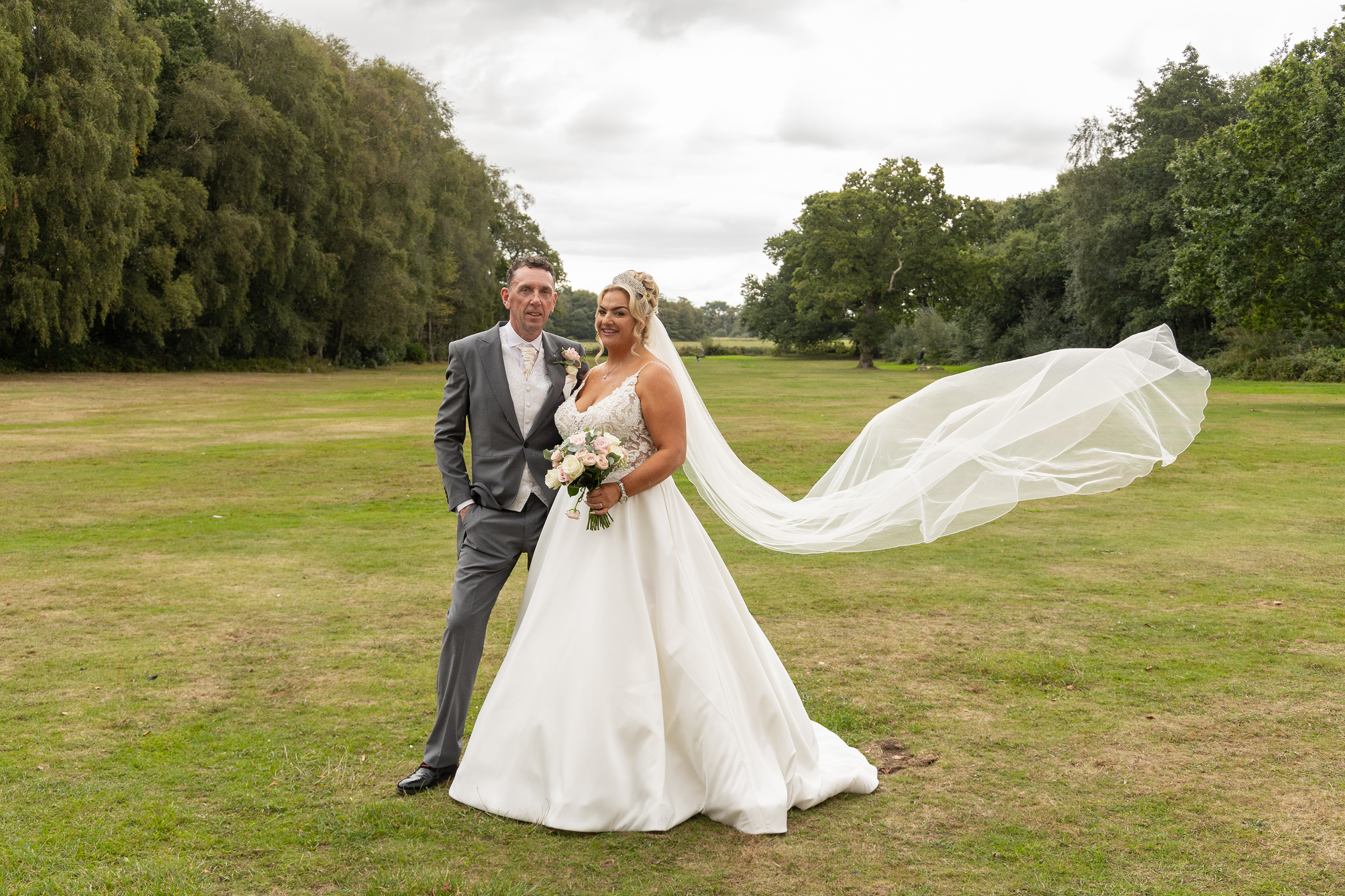 Tony and Amy pose for a wedding photo at Lytham Hall 