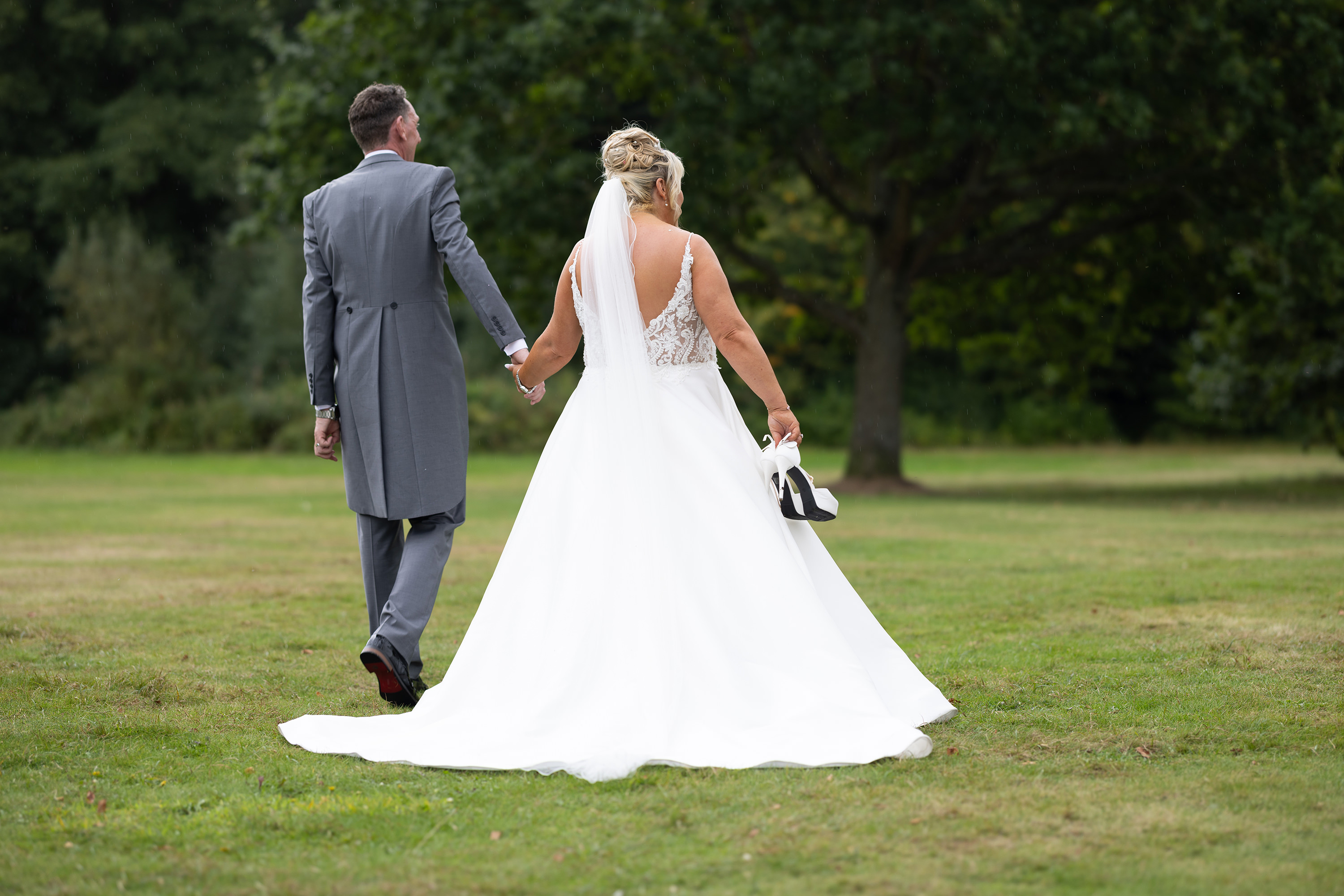 The bride and groom go for a walk 