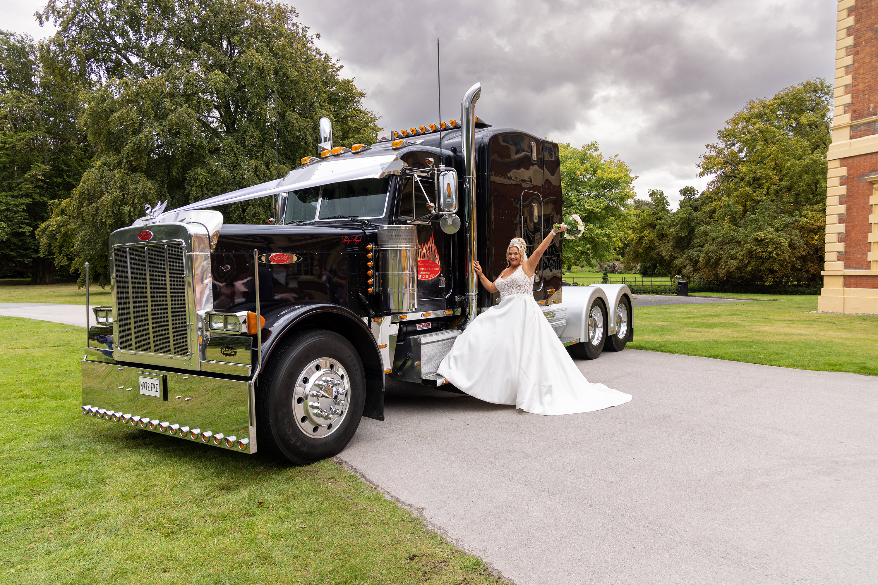 The Bride Amy poses for a photo with the lorry