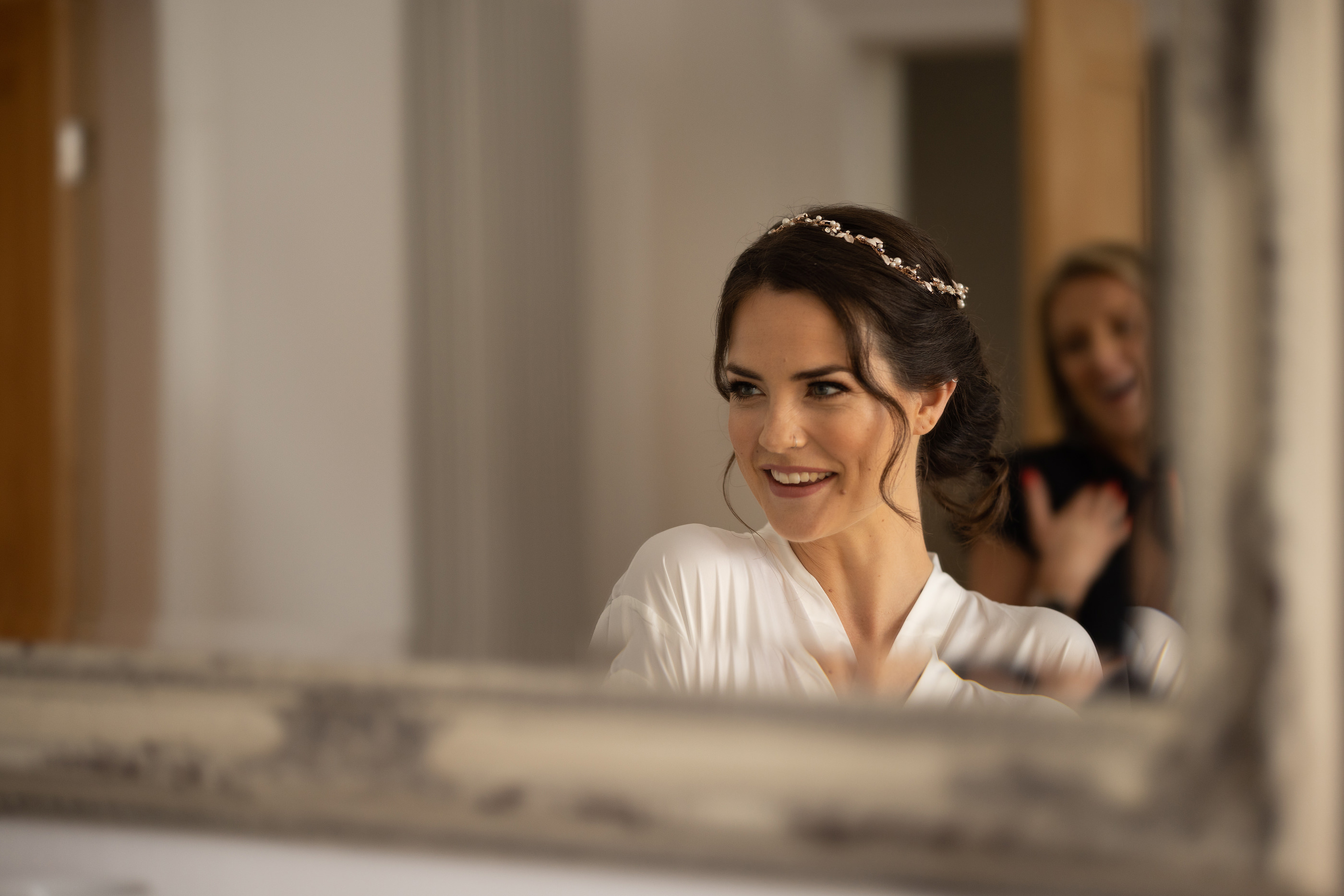 The Bride looking at herself in the mirror 