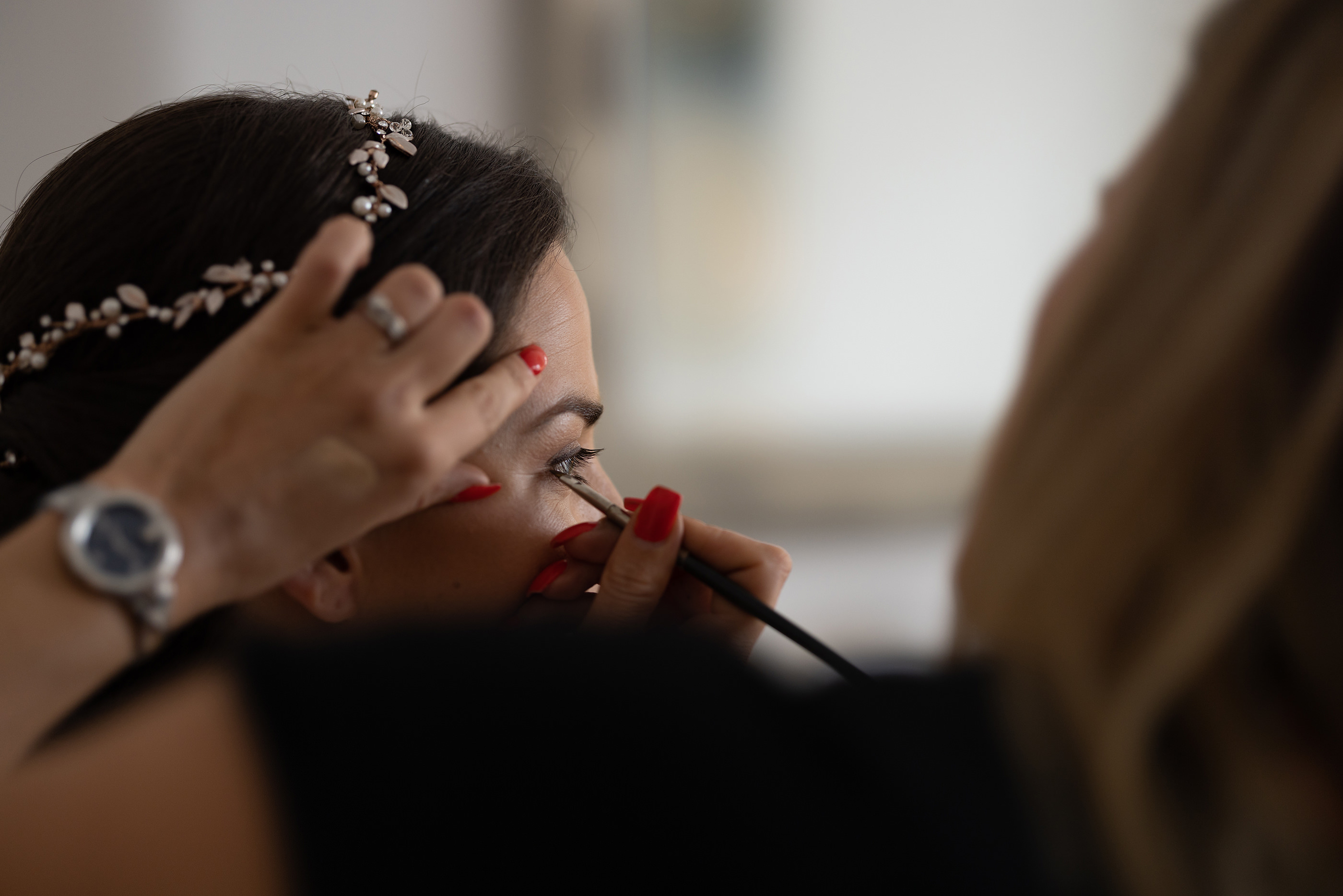 The Bride Chelsea having some makeup put on 
