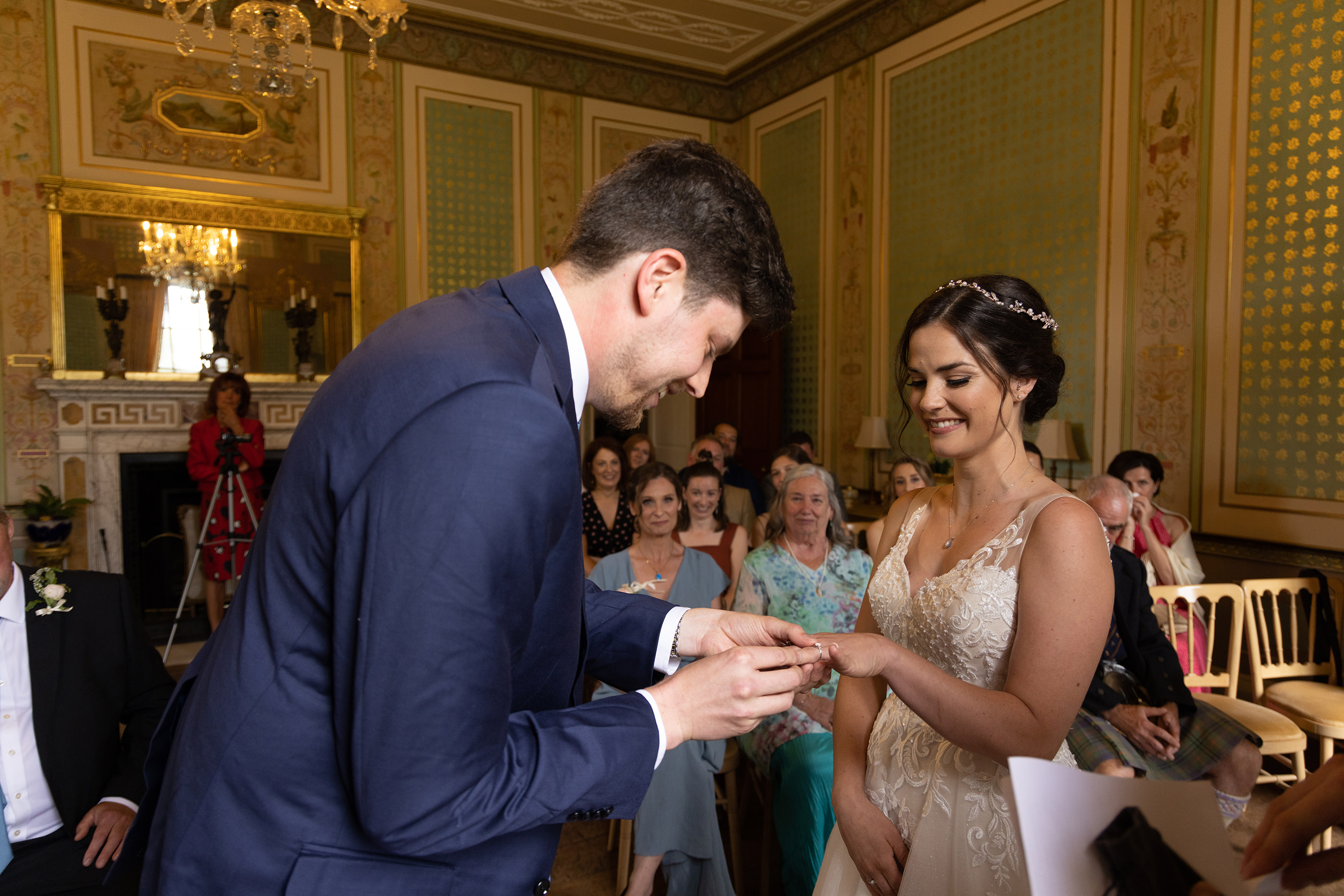 James puts Chelsea's wedding ring on her finger 