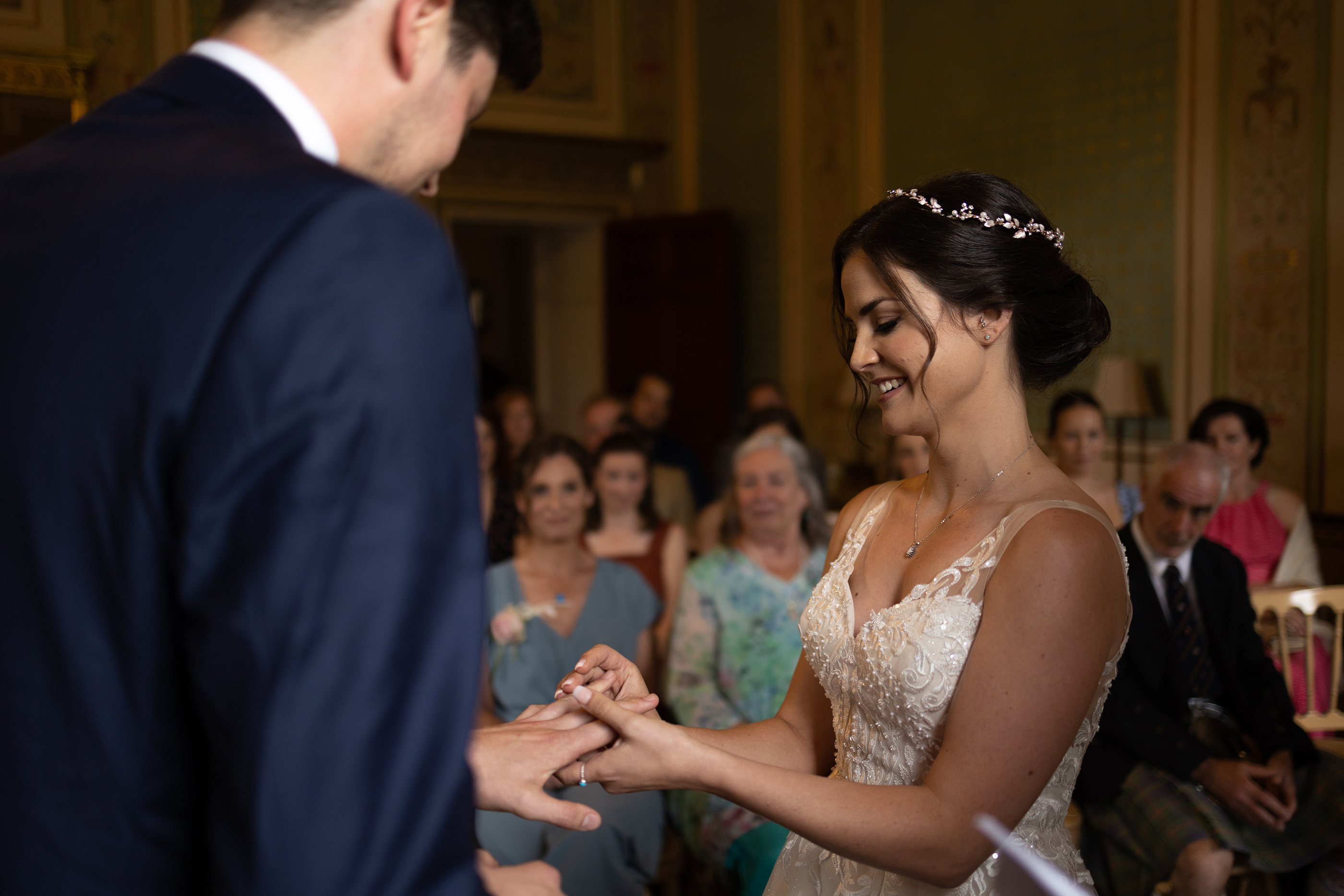 Chelsea puts James his wedding ring on his finger 
