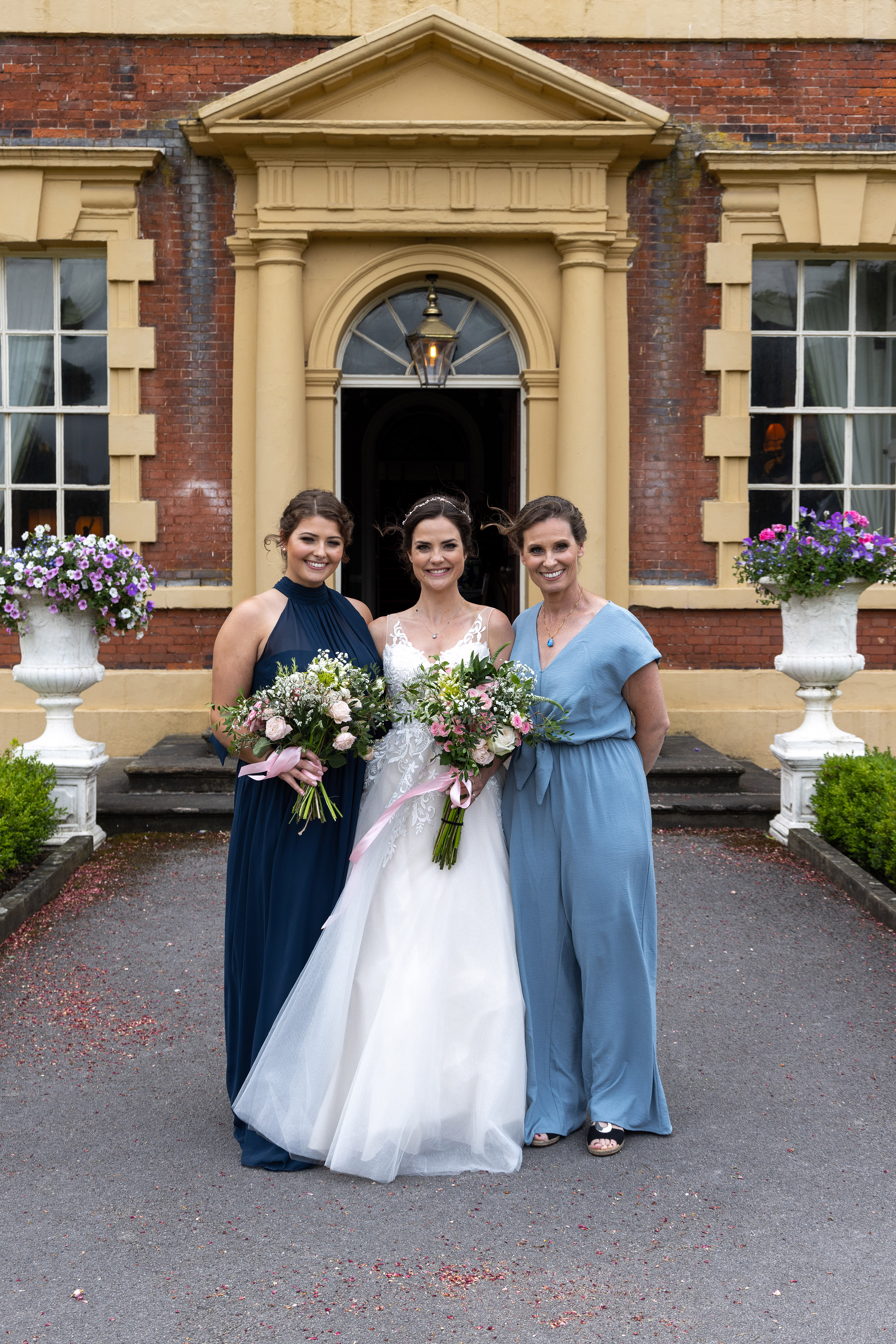 The bride with her mother and sister 