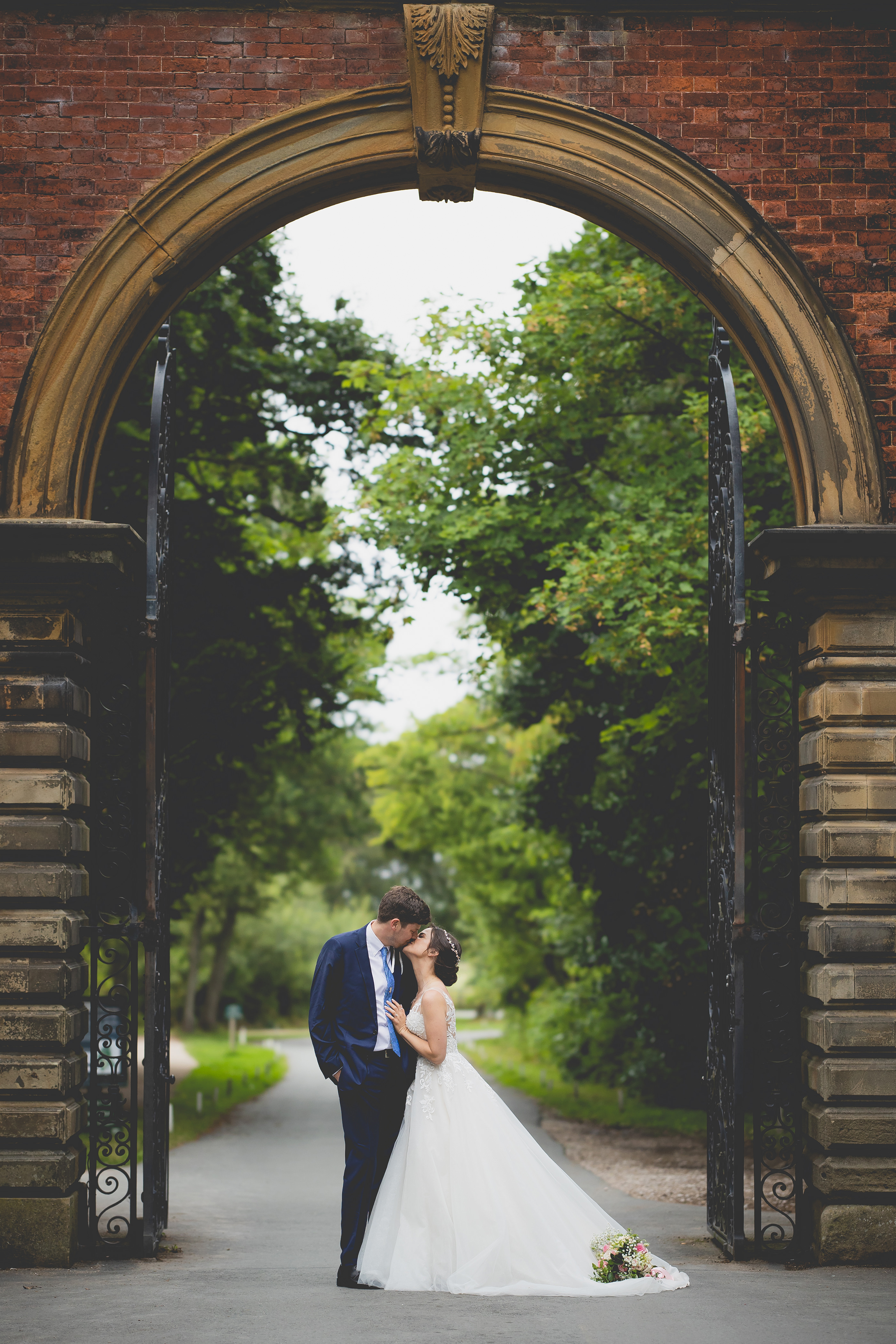 The bride and groom kissing at Lytham Hall 