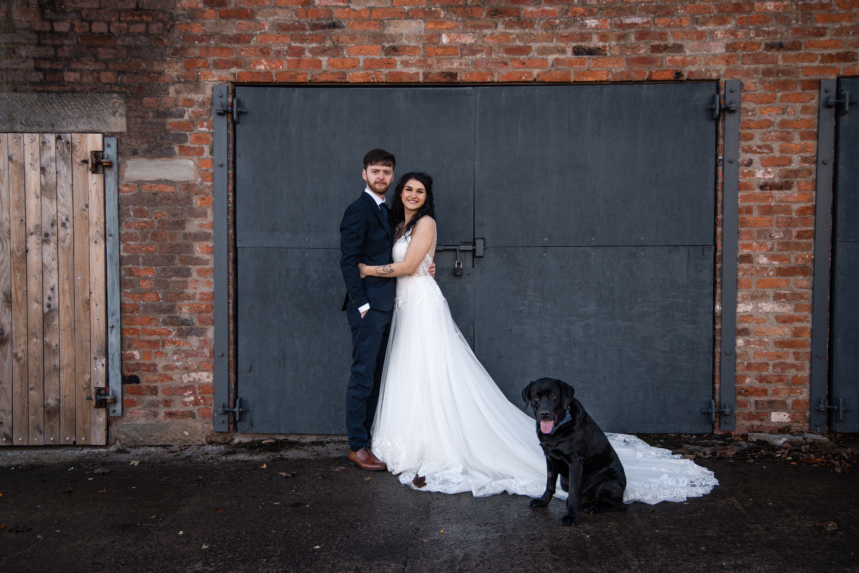 Emily and Neil with the pet dog 