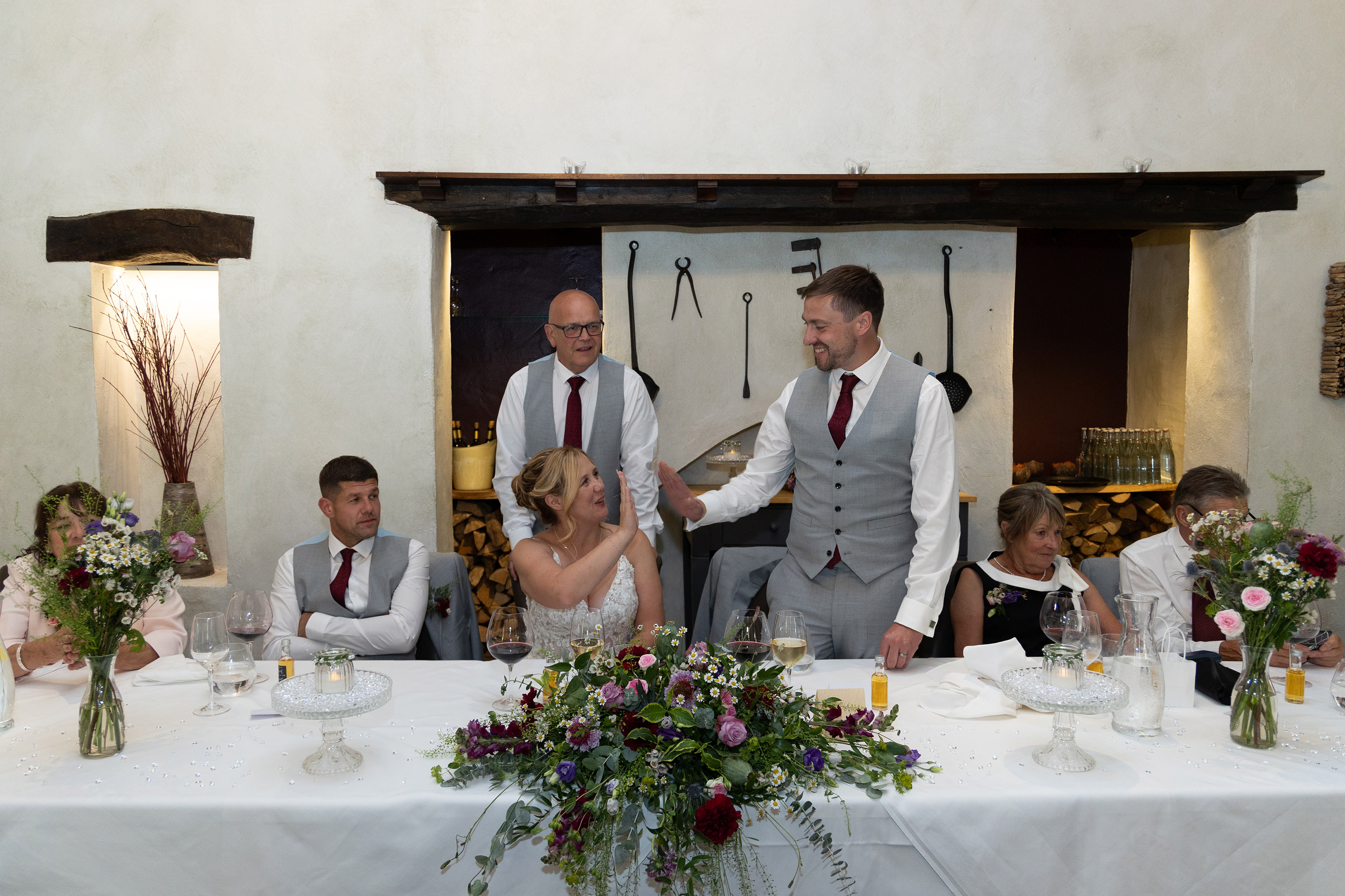 The bride and groom at the wedding reception 