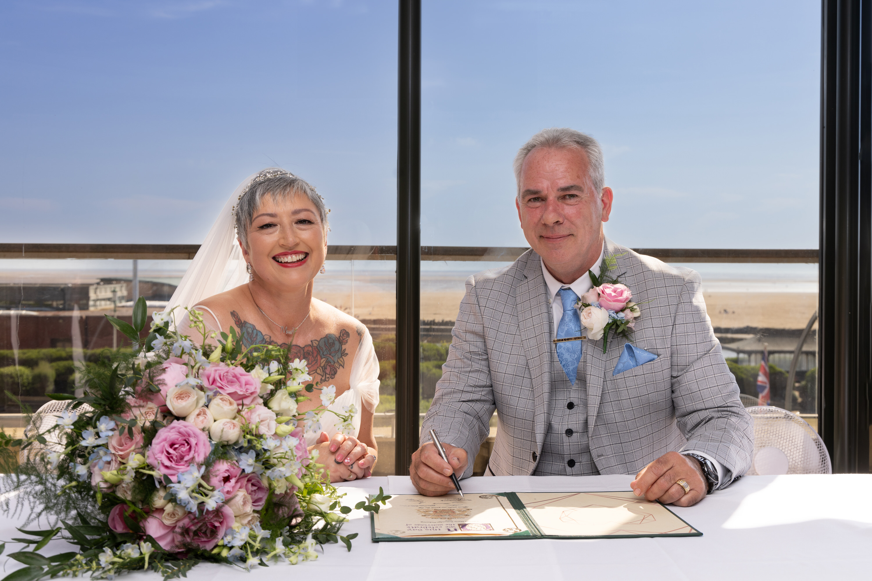 Caroline and Peter signed the wedding register 