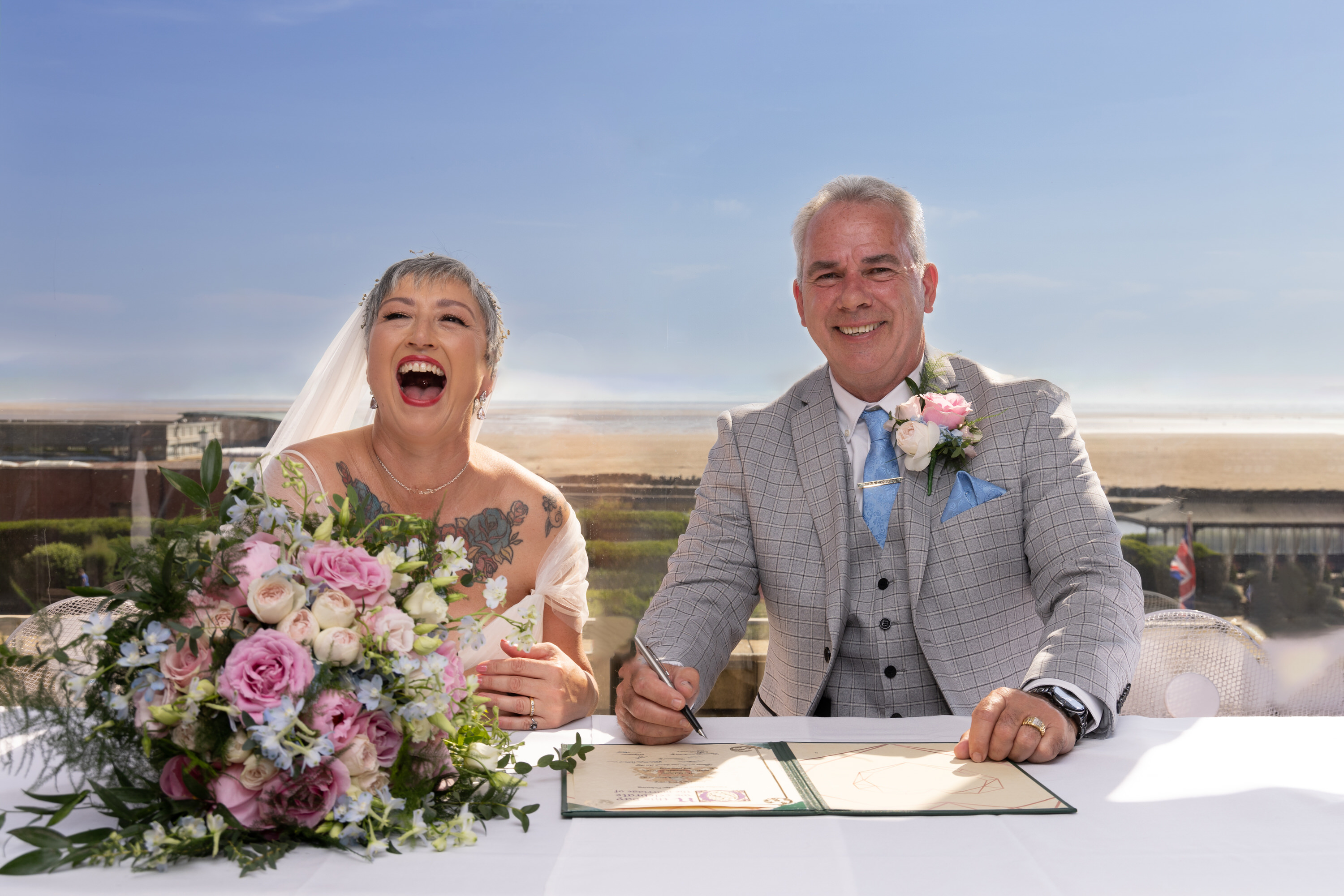 Caroline and Peter signed the wedding register 
