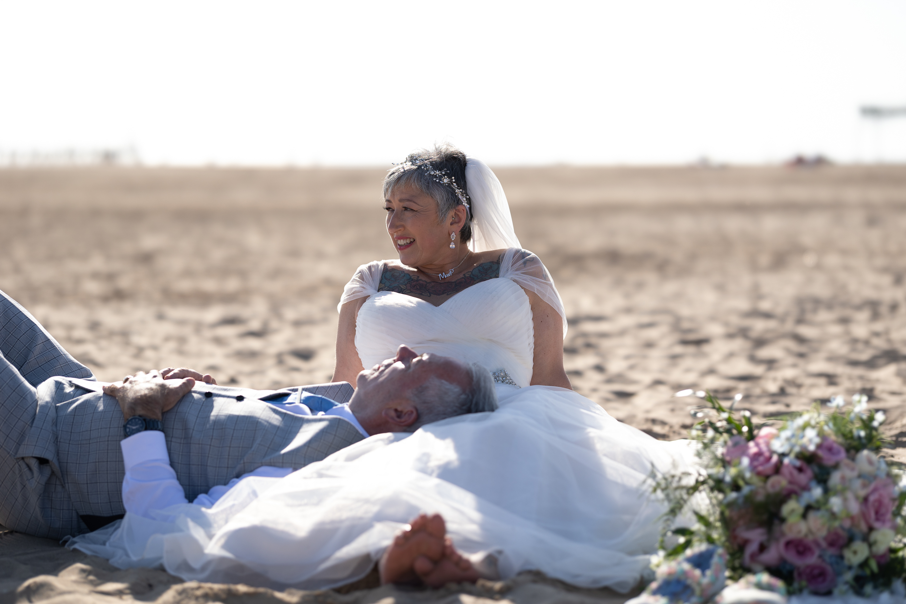 Caroline and Peter relaxing on the beach 