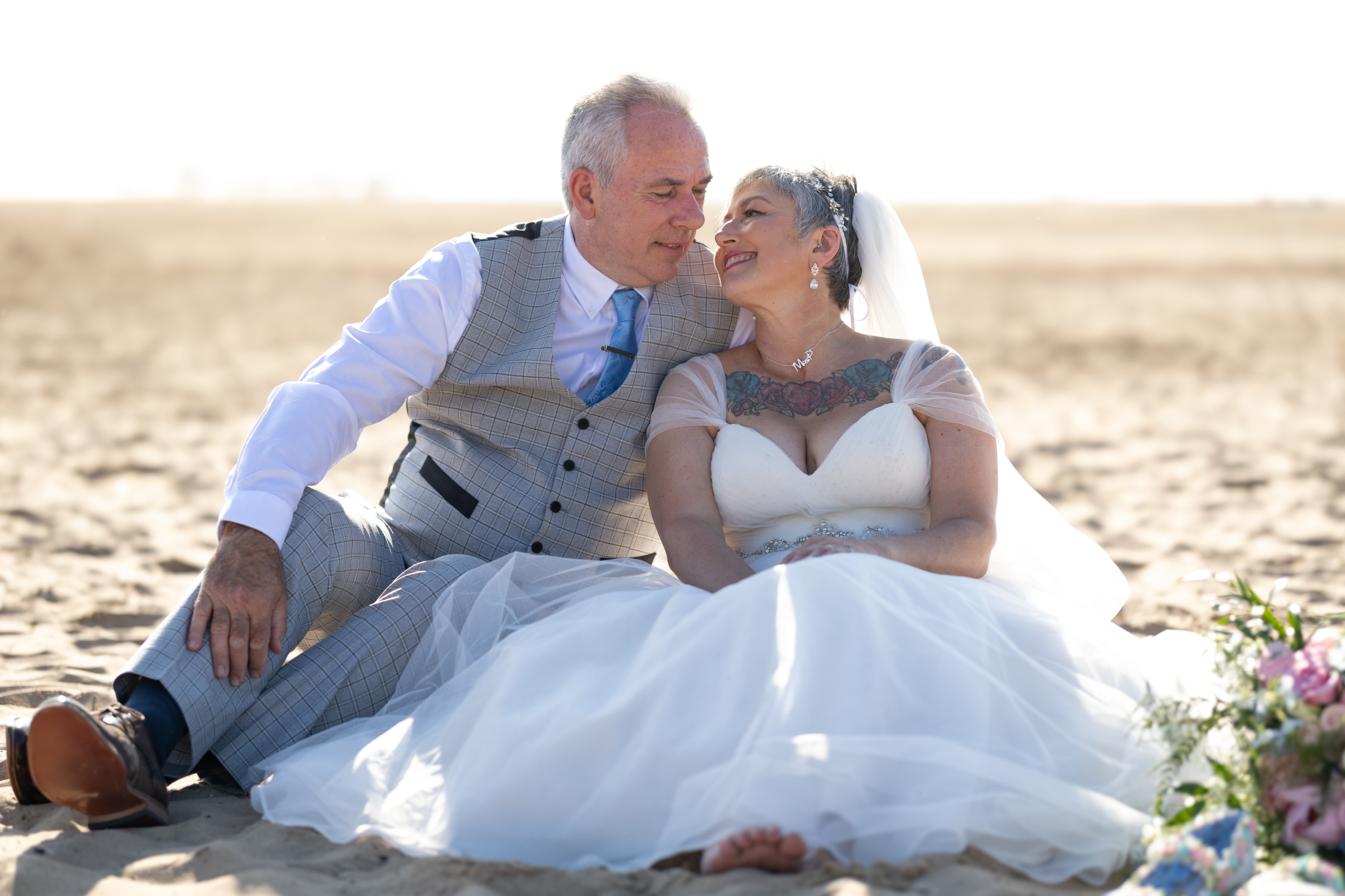Caroline and Peter relaxing on the beach 