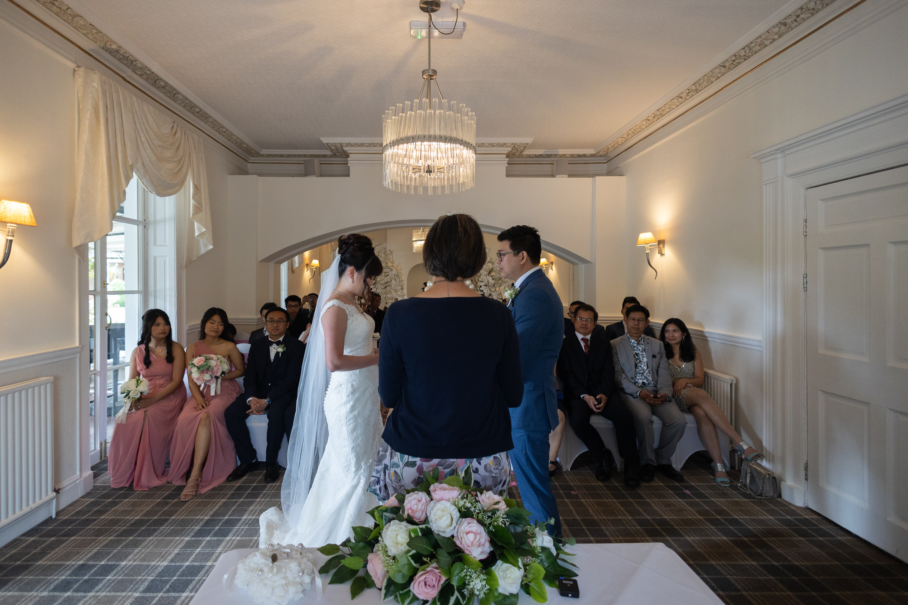 The wedding ceremony gets underway at Rosset Hall Hotel
