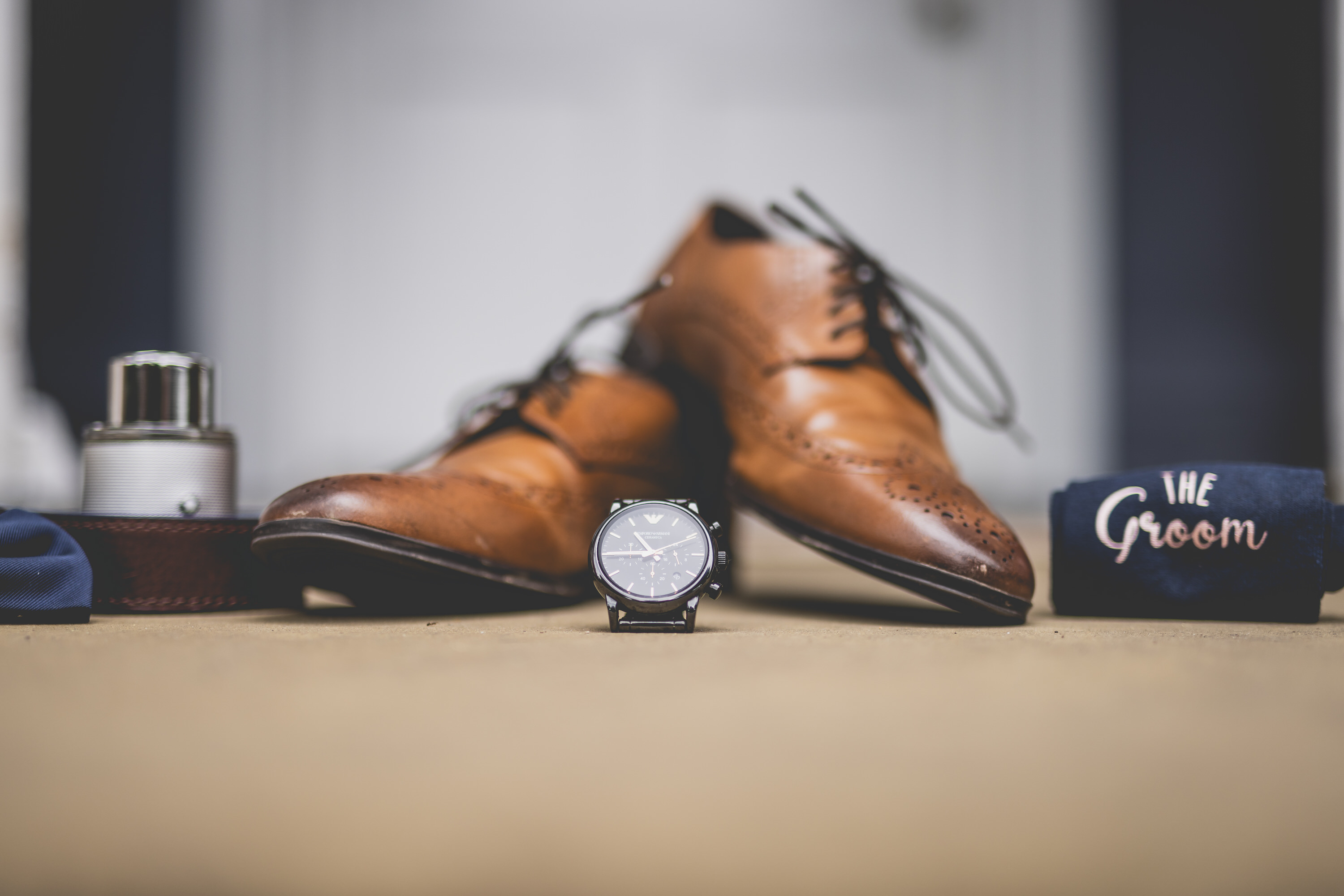 The grooms wedding shoes and watch 