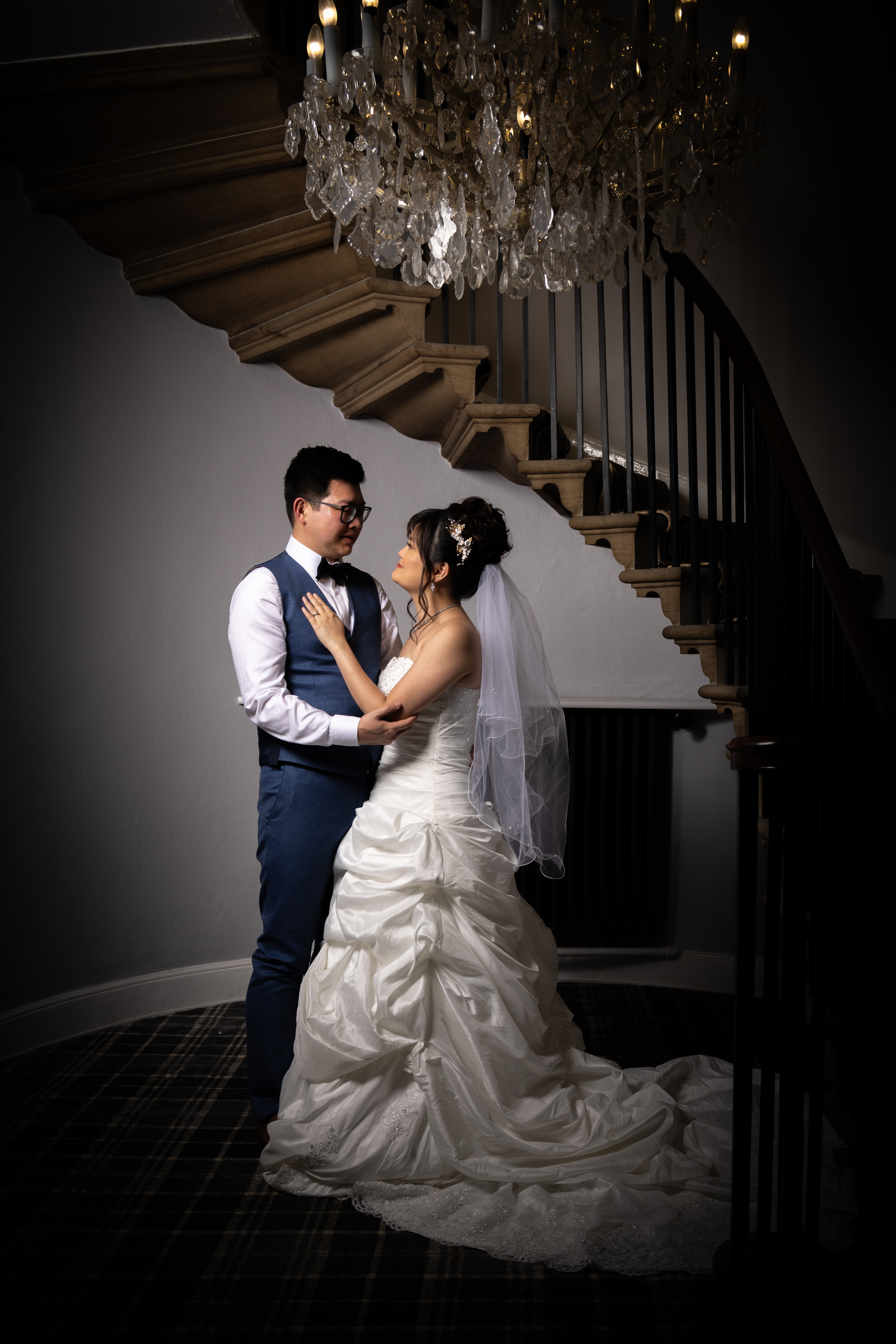 Bride and groom posing for a photo at Rossett Hall Hotel