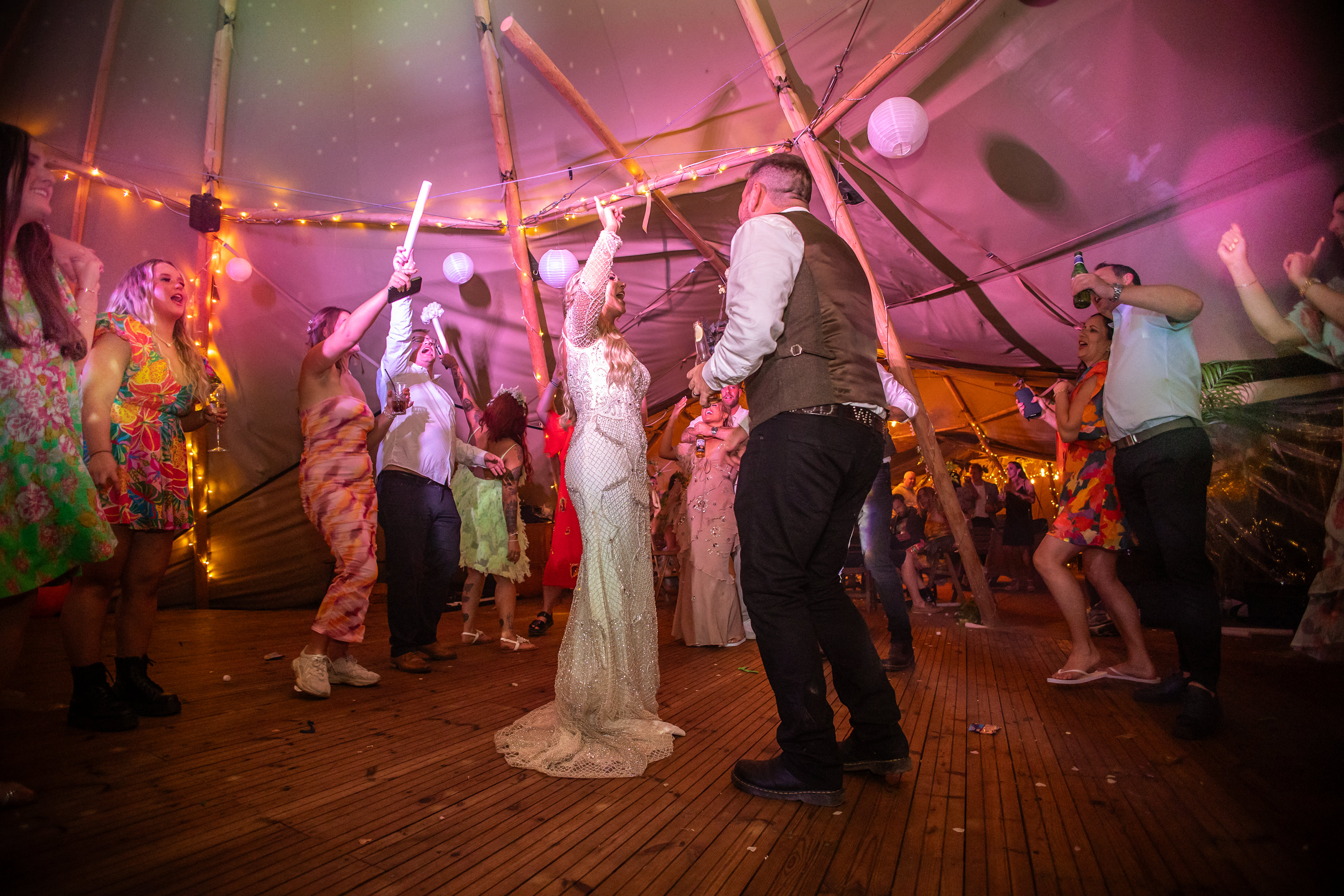 The Bride and groom dance together 