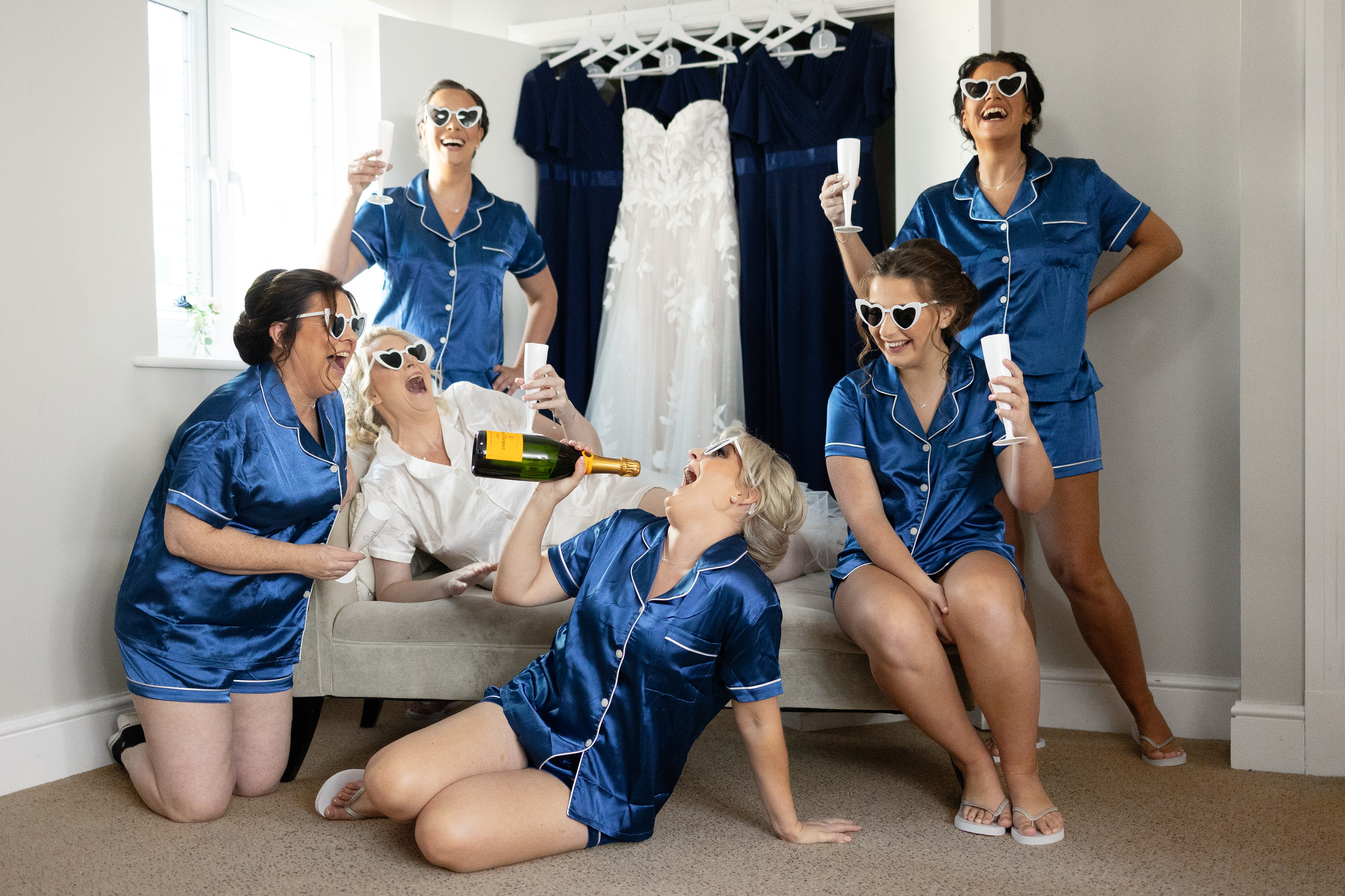 The bride and bridesmaids having fun 