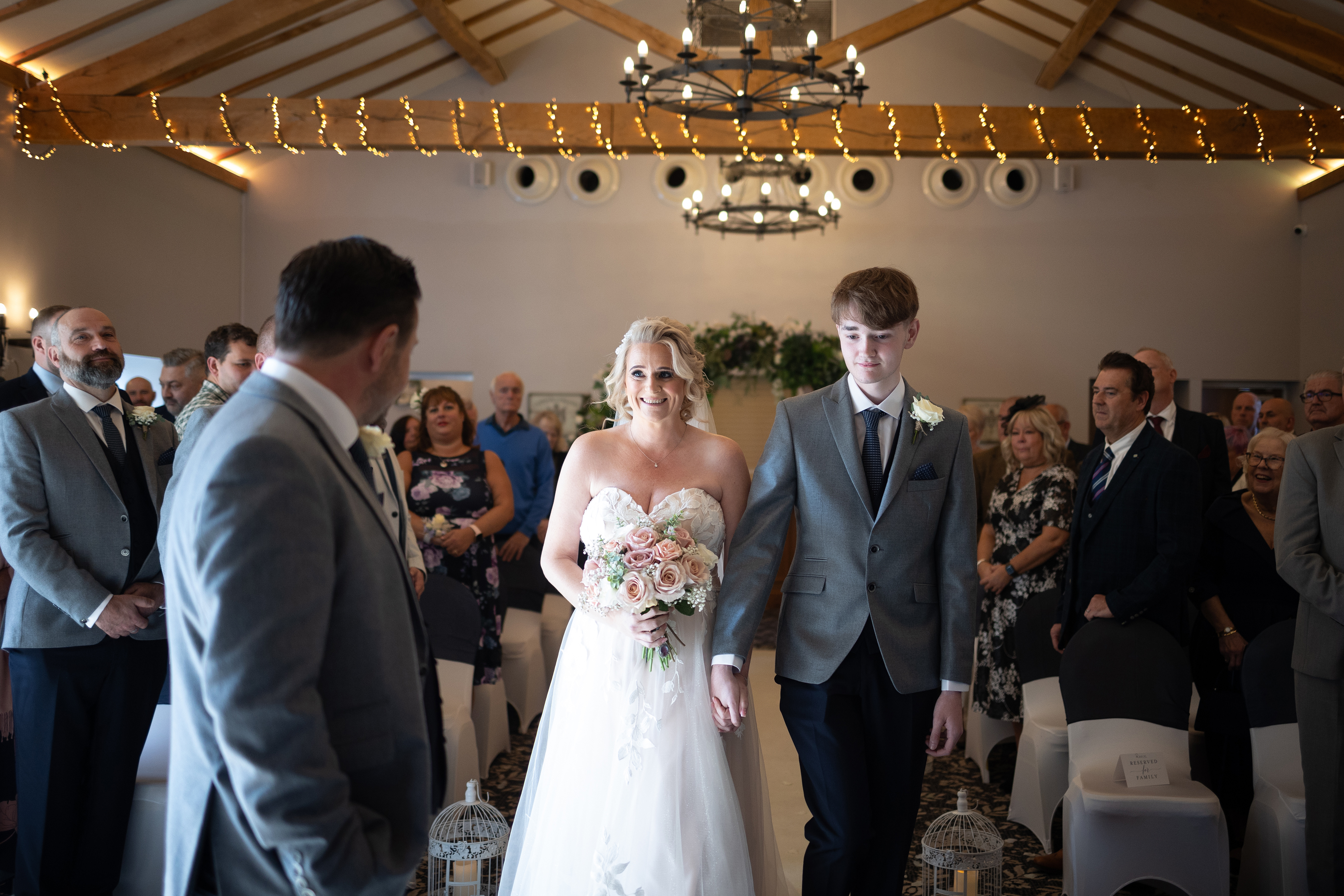 Brenda walks down the aisle with her son 