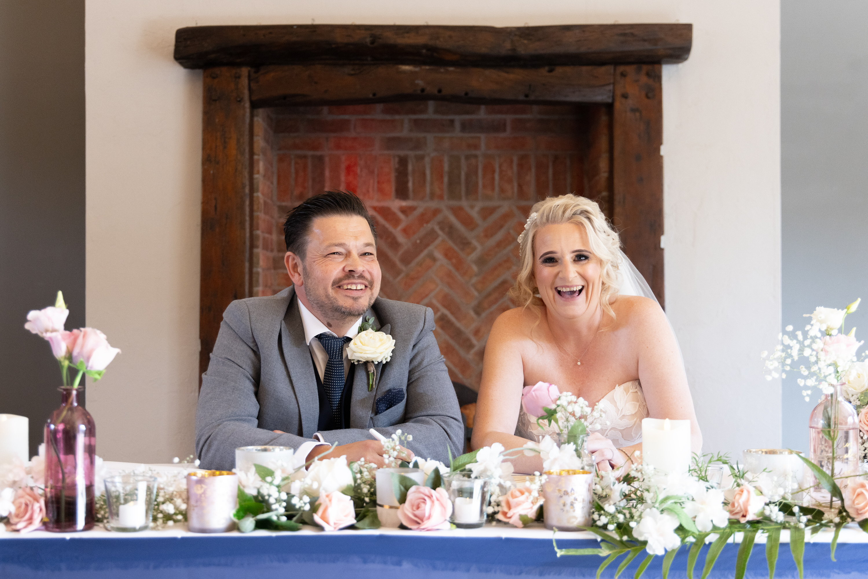 Brenda and James signed the wedding register 