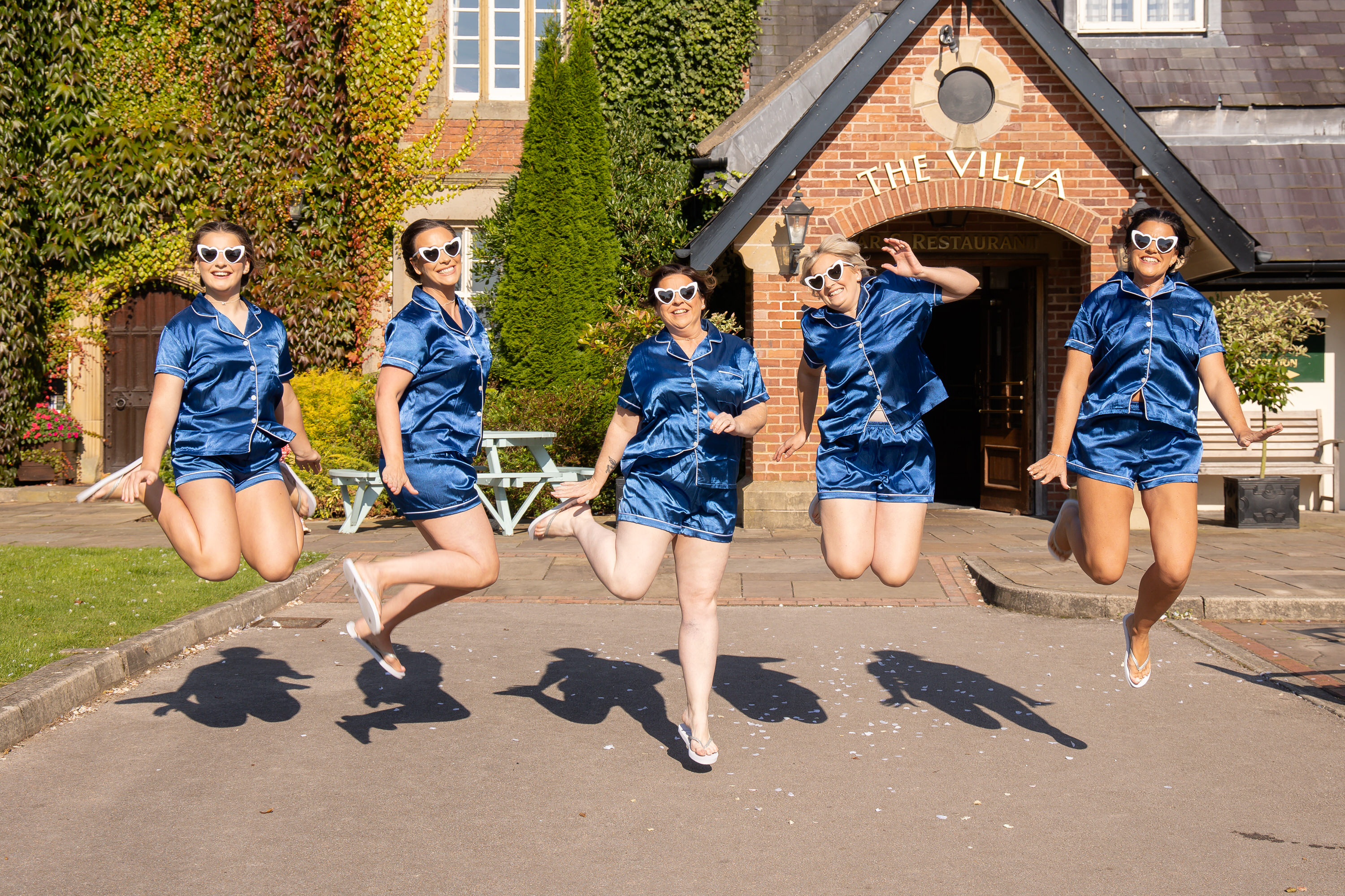 The bridesmaids are jumping for joy 