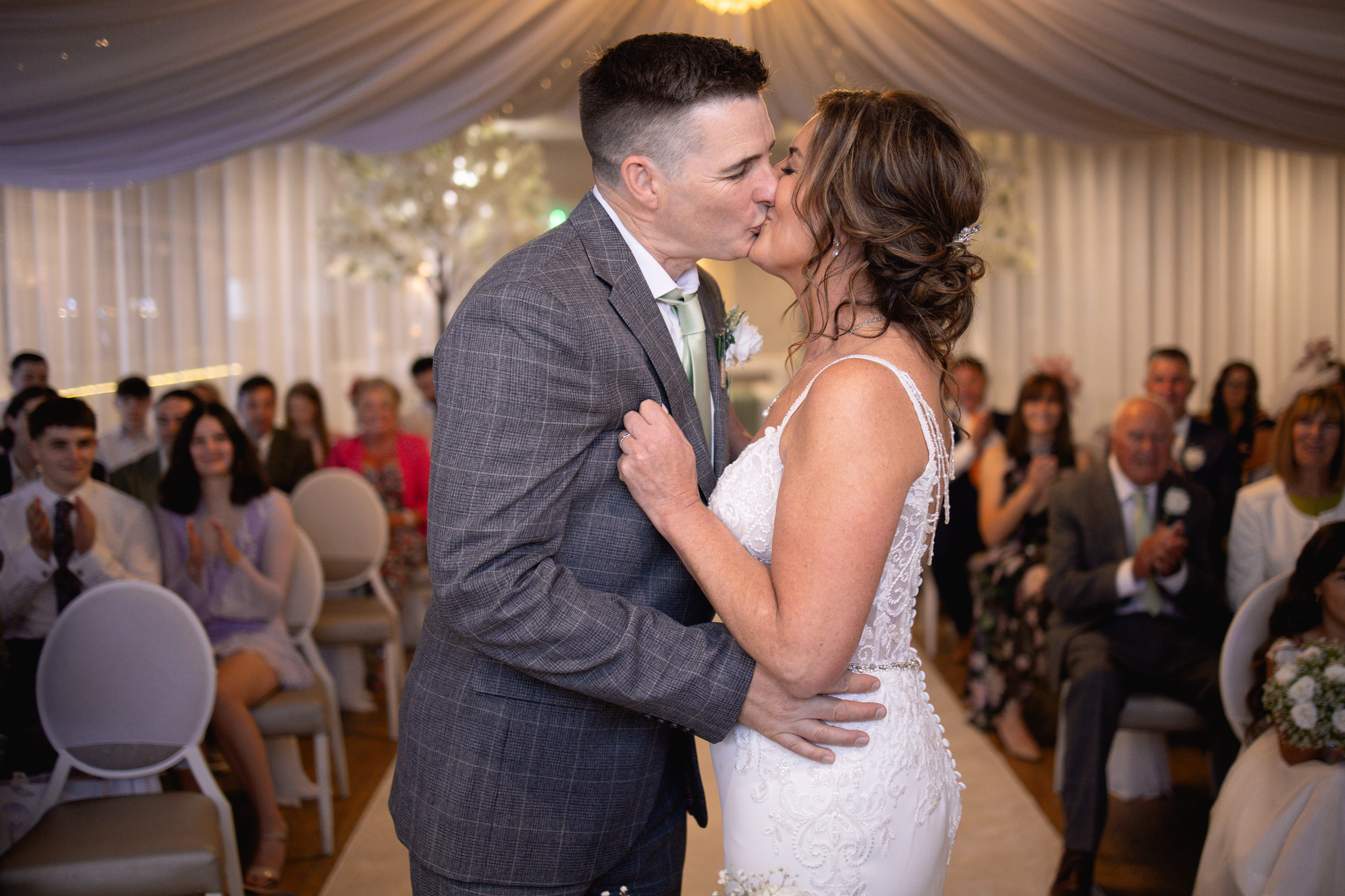 Claire and tony seal their wedding with the kiss
