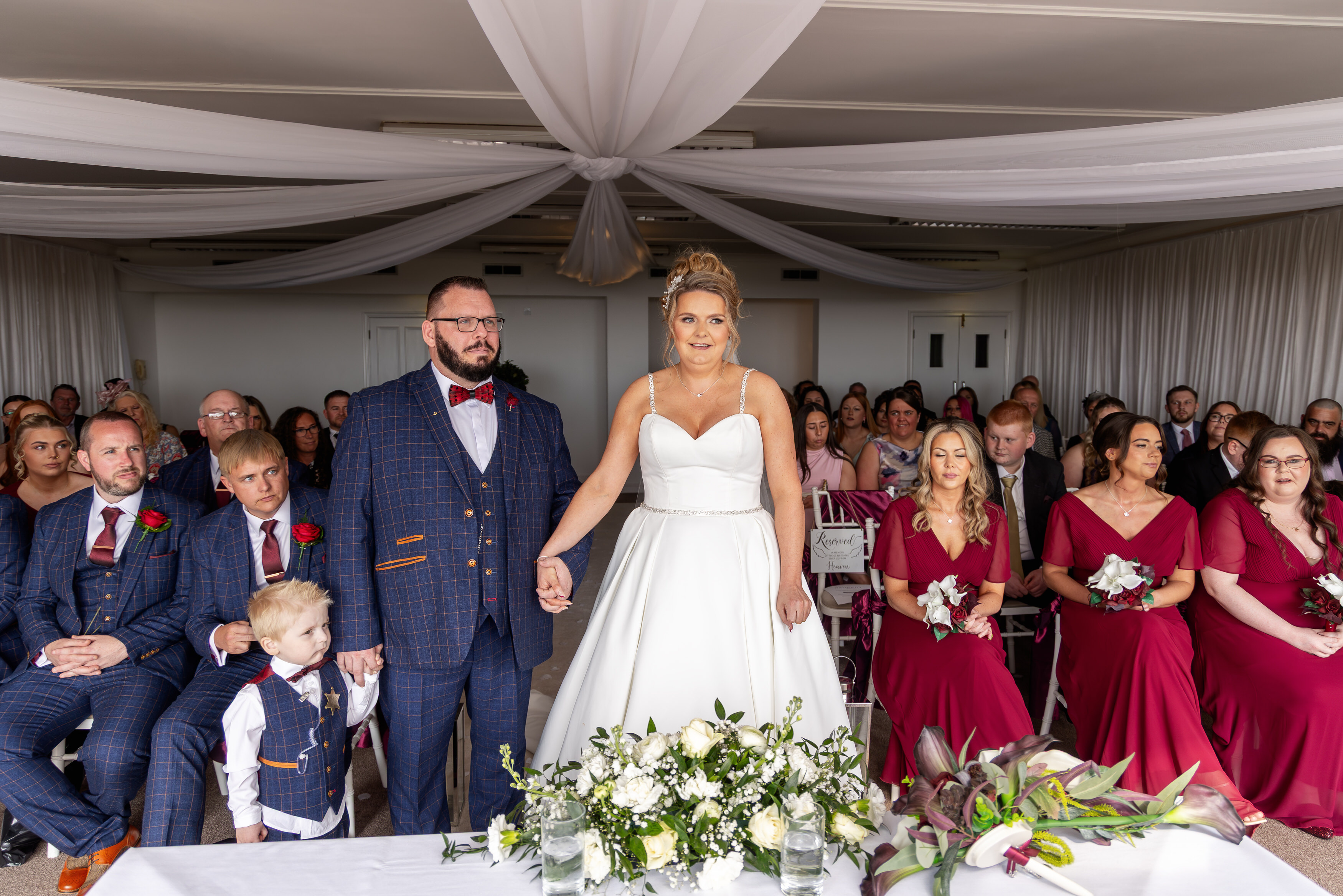 The bride and groom in the ceremony room 