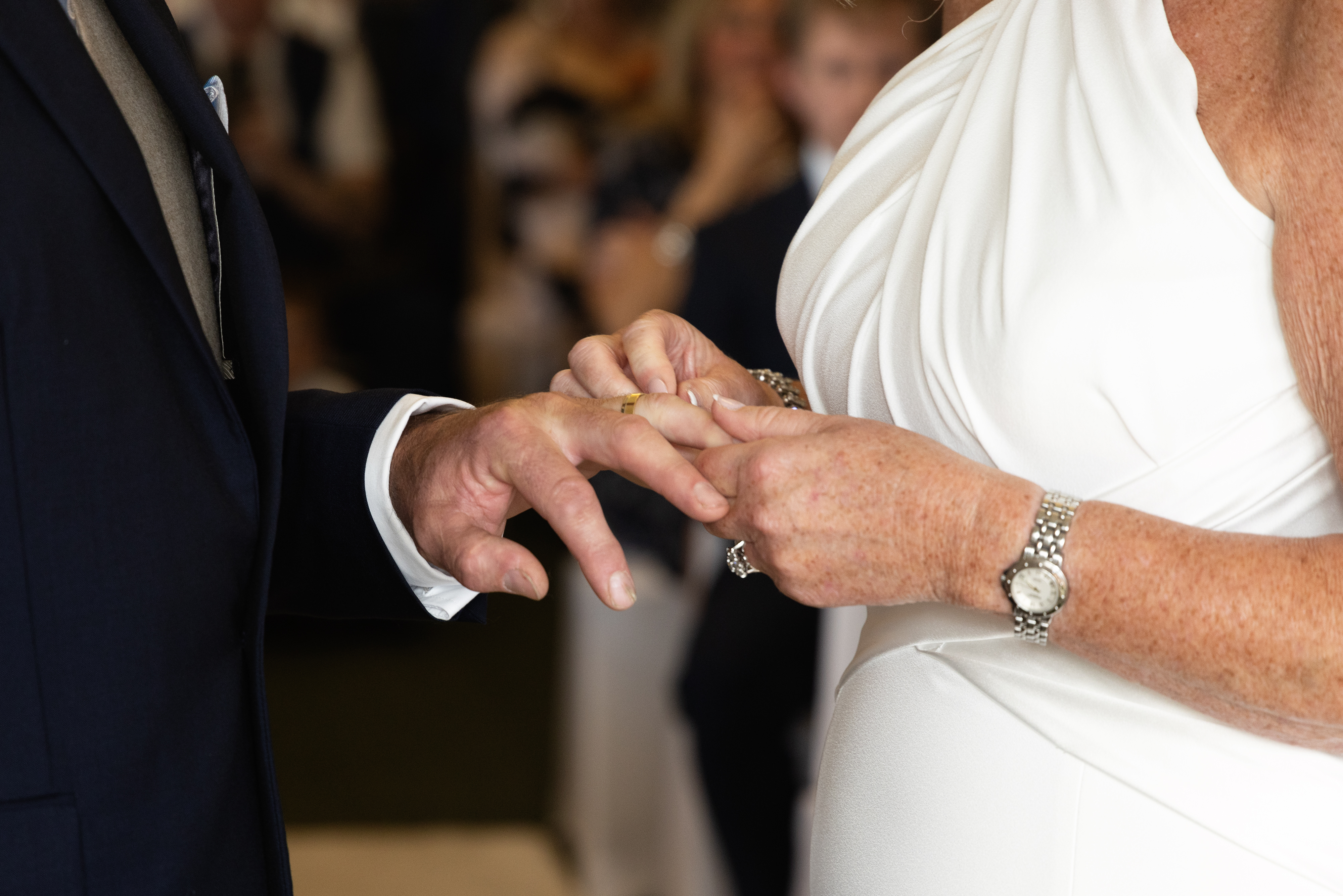 The Bride puts on the wedding ring 