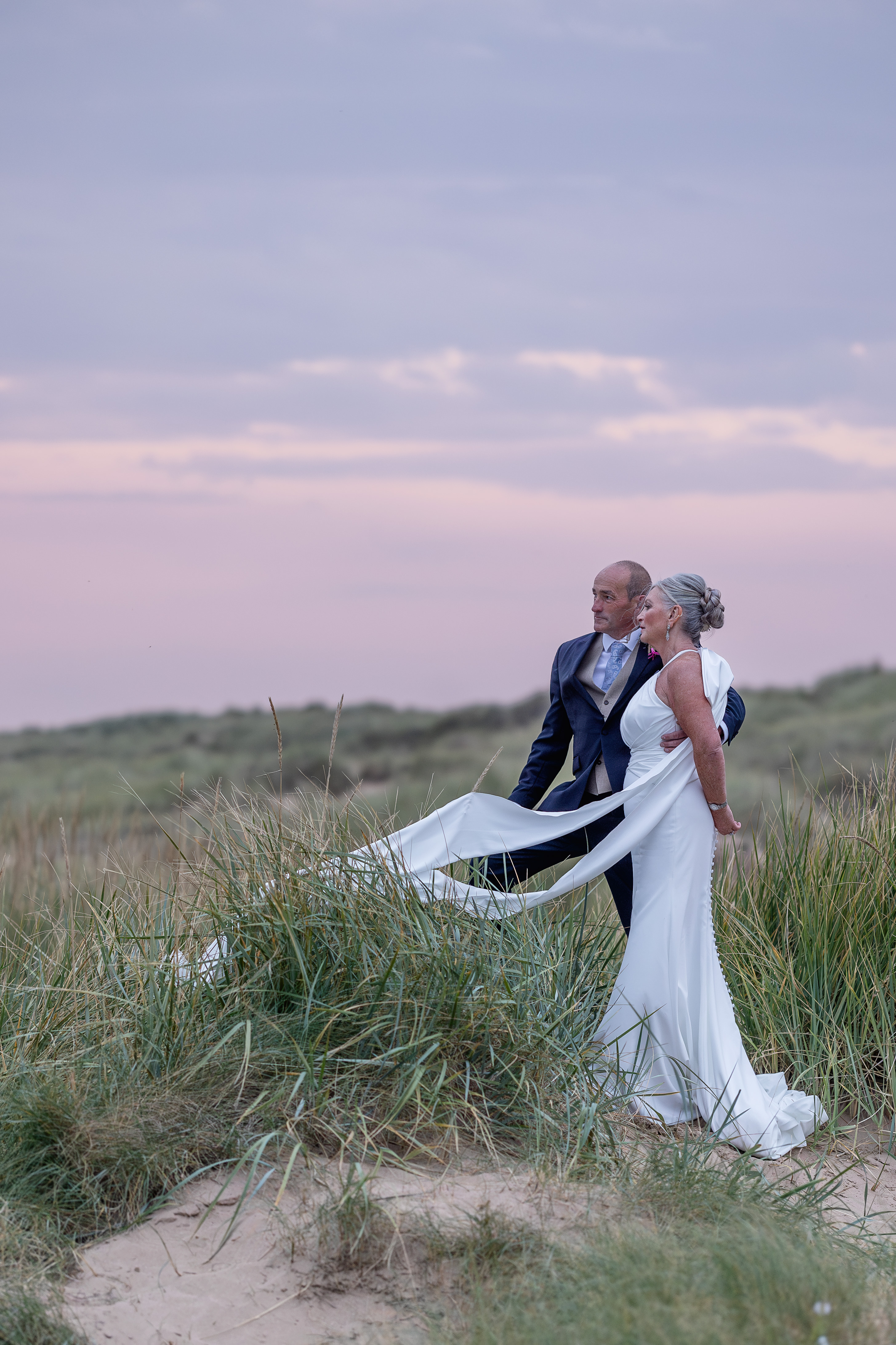Marie and Duncan pose for a wedding picture 