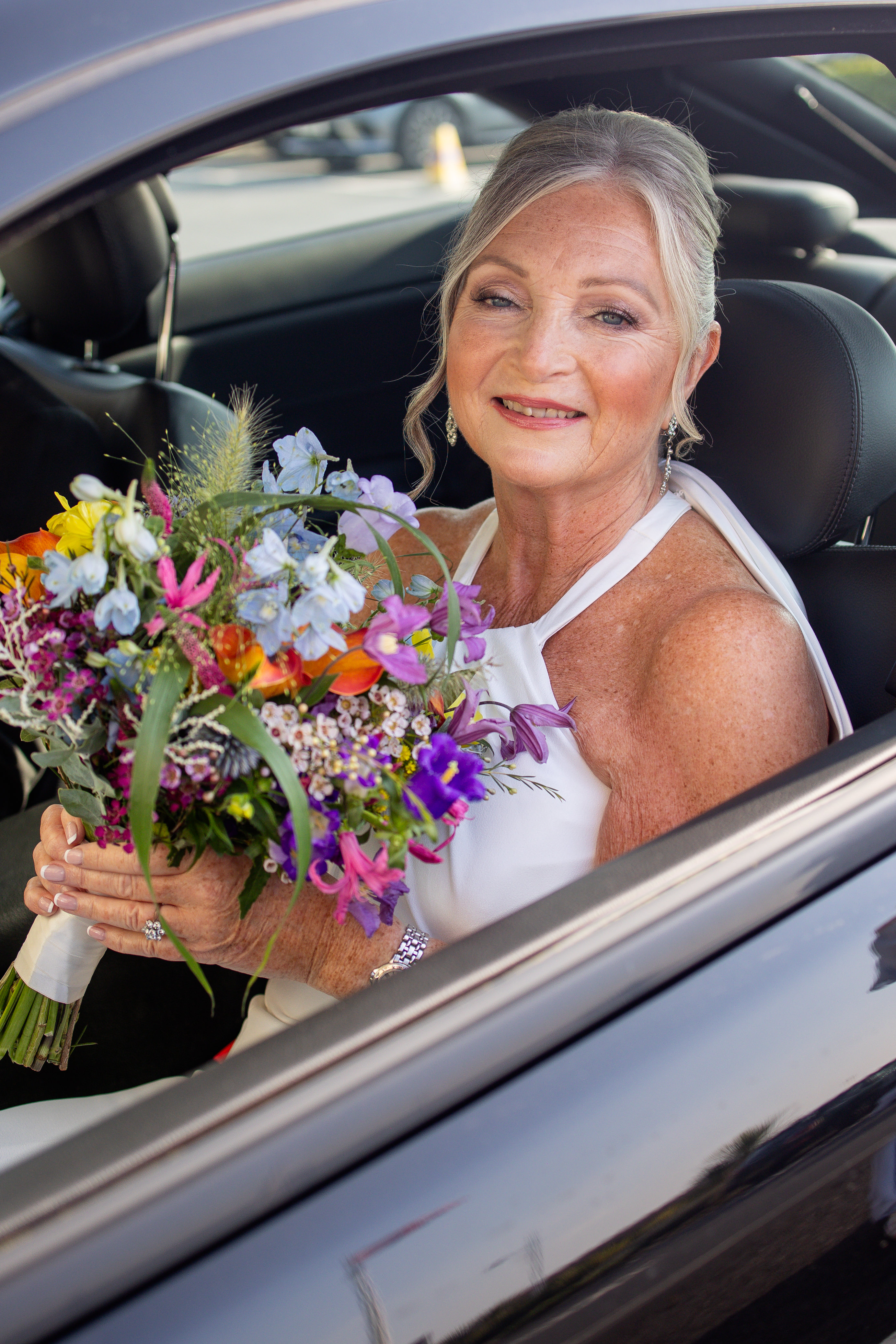 Marie the Bride arrives in the wedding car 