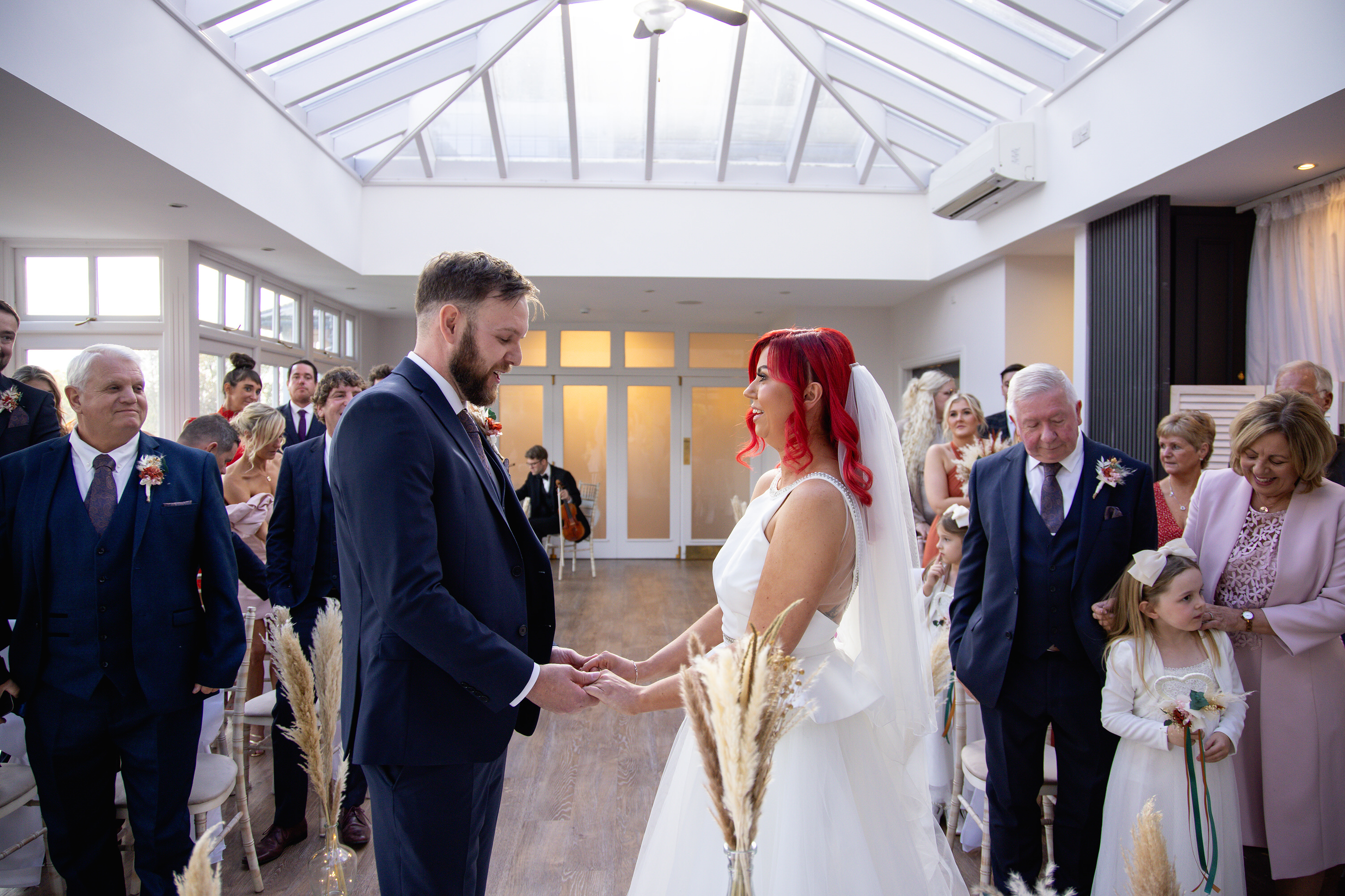 The bride and groom exchange their wedding vowels 
