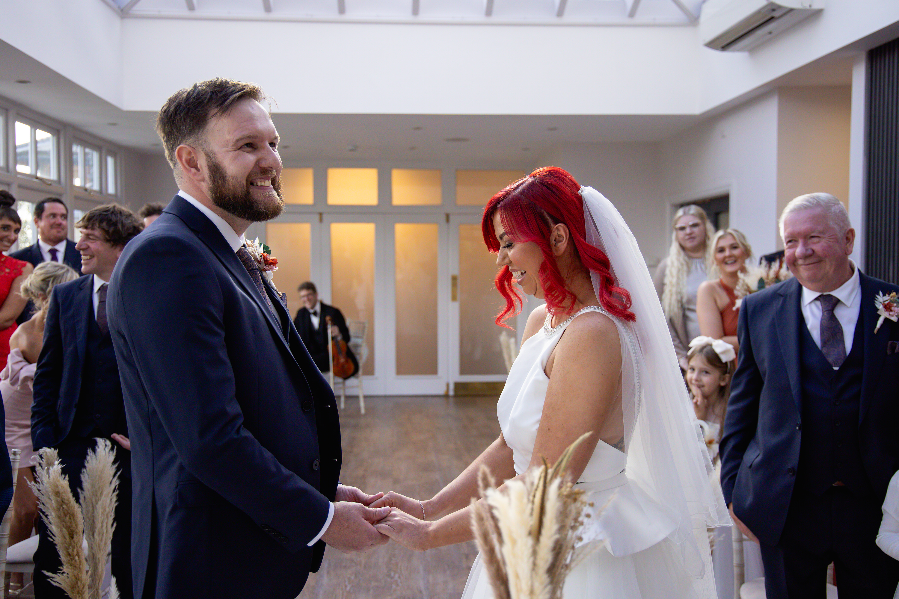 The bride and groom exchange their wedding vowels 
