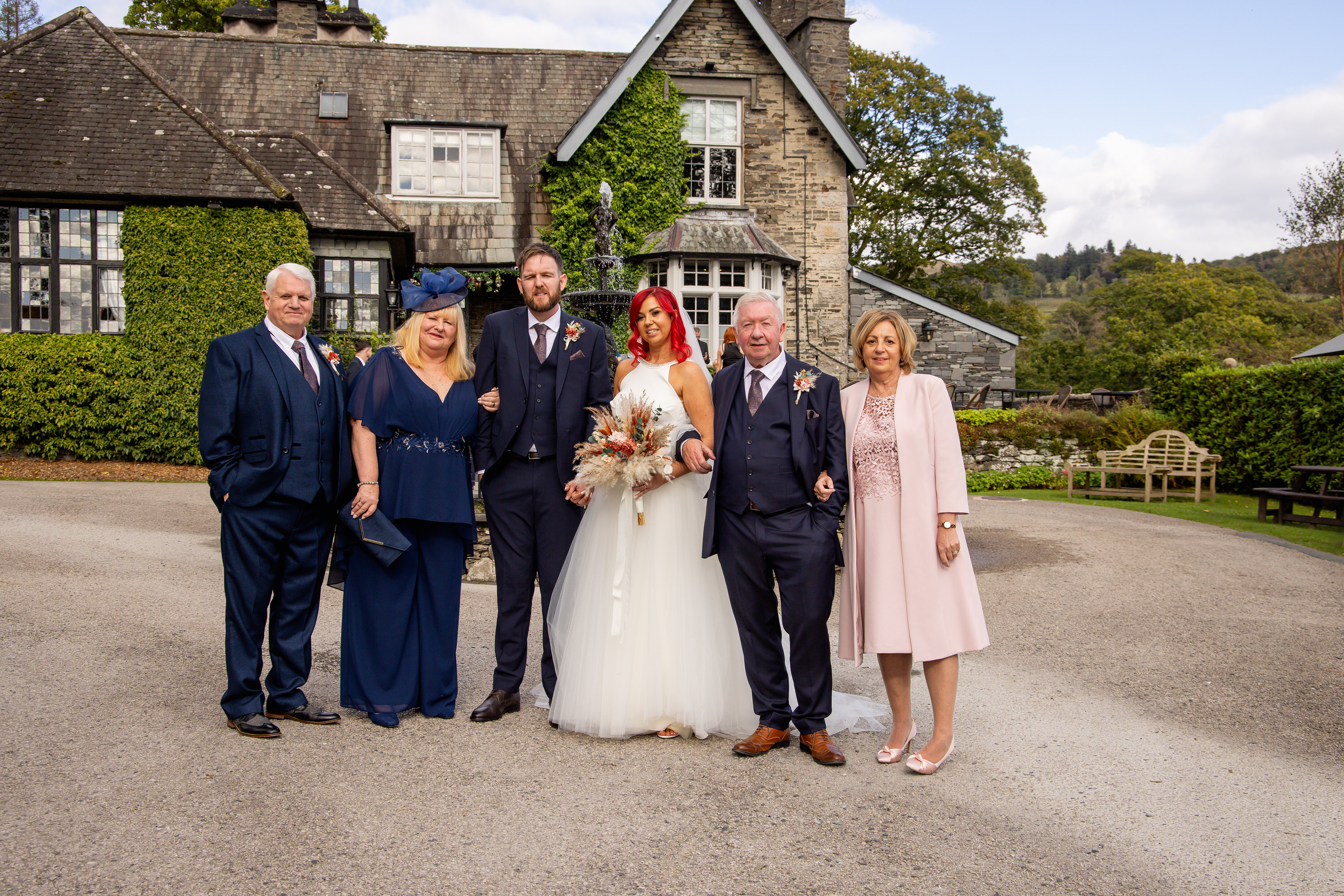 The bride and groom with their parents