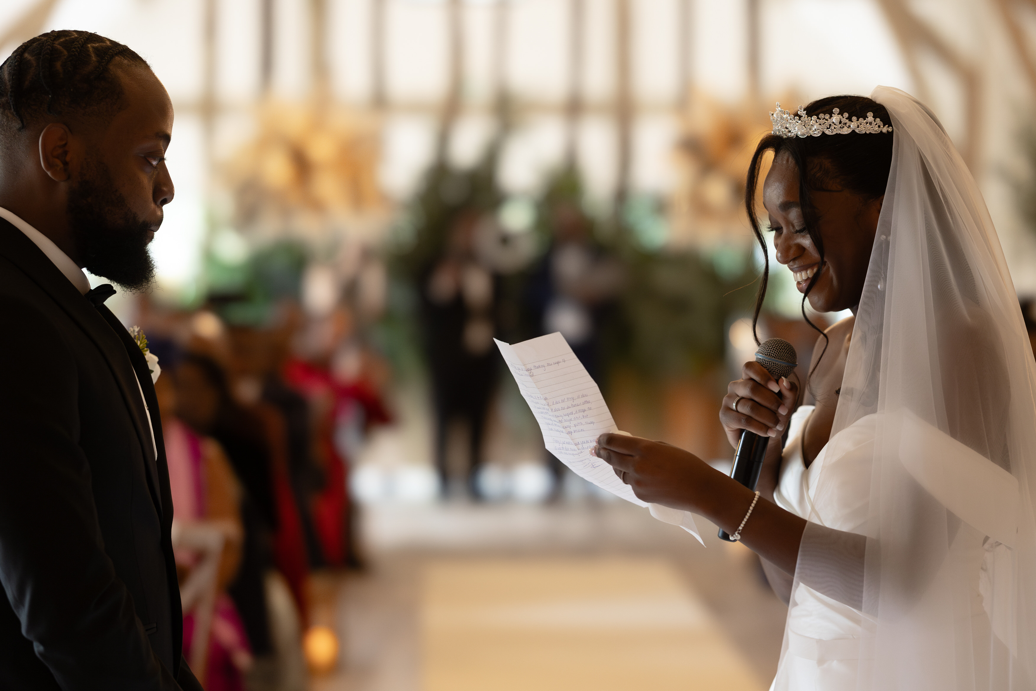 The Bride reads out her wedding vowes