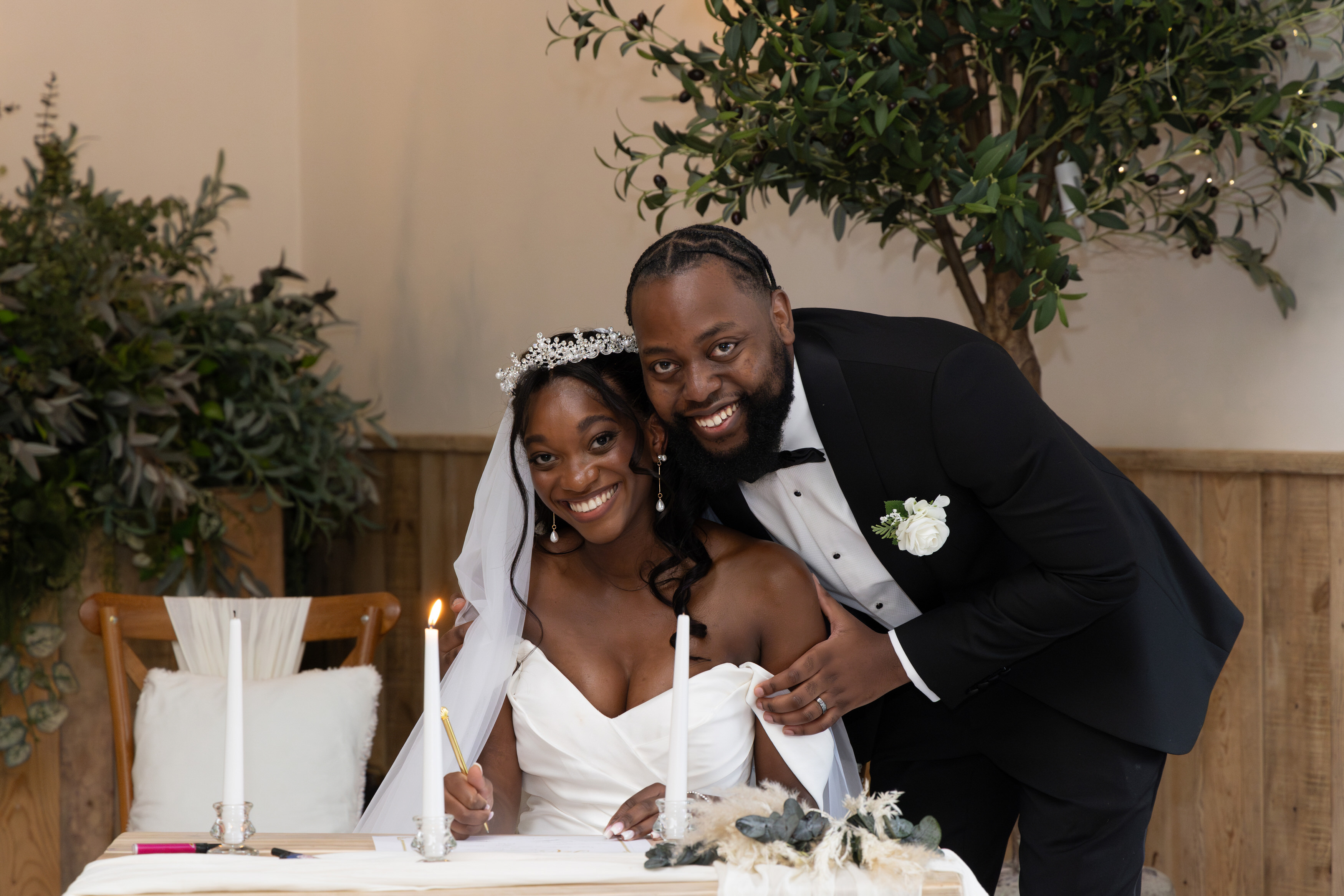 The bride and  grooms signed the wedding certificate