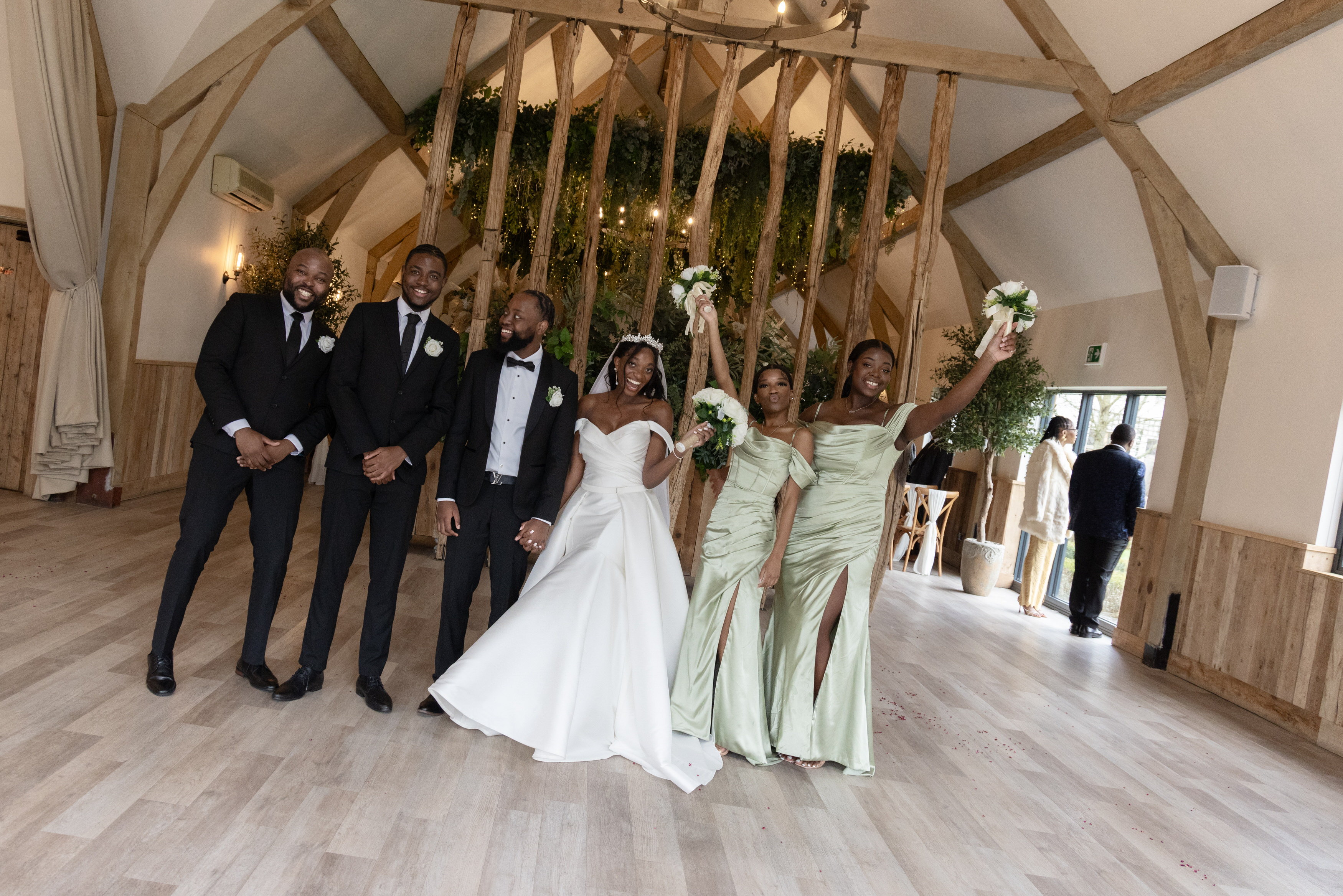 The Brian and Groom with the best men and women 