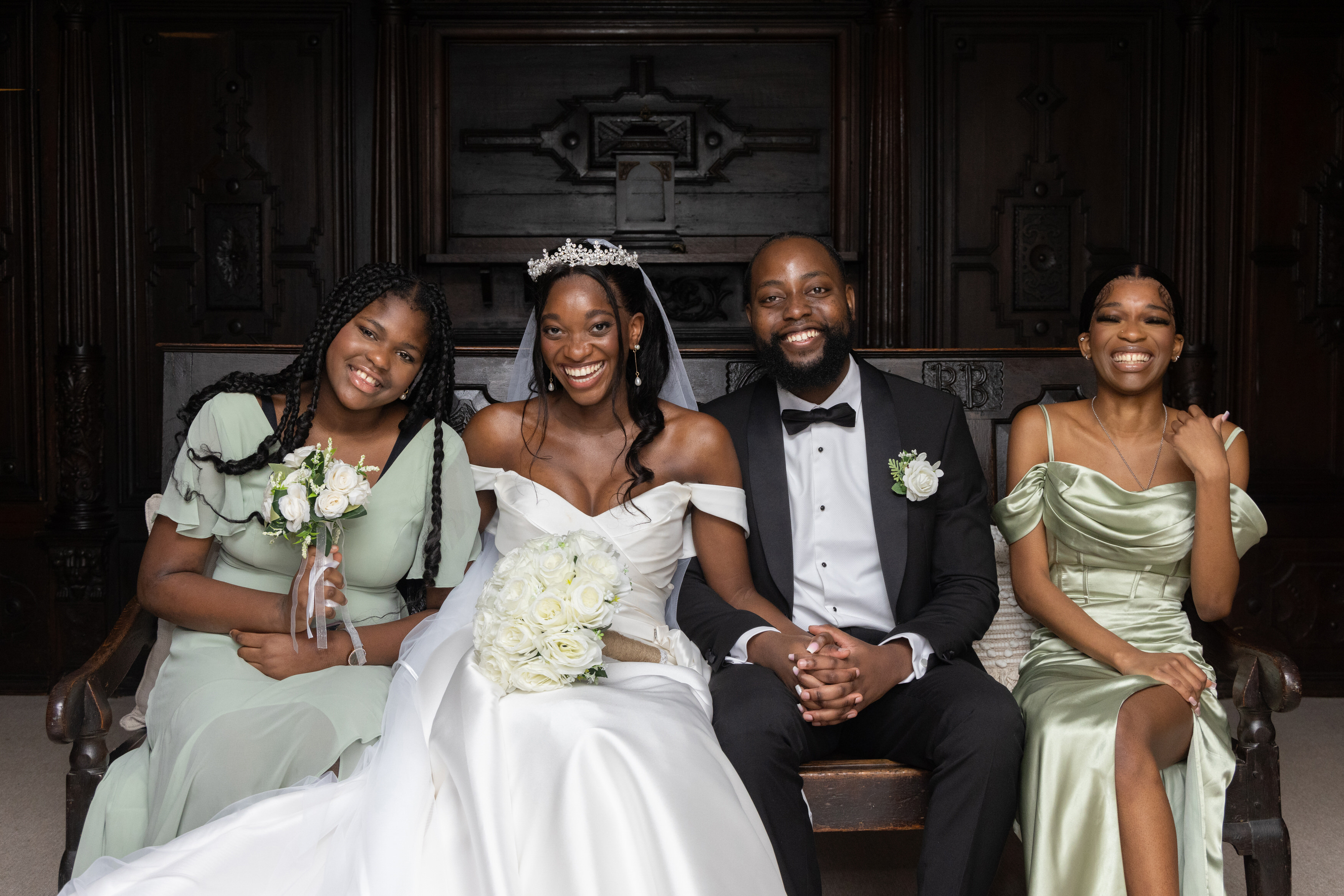 The bride and groom have photos with their family