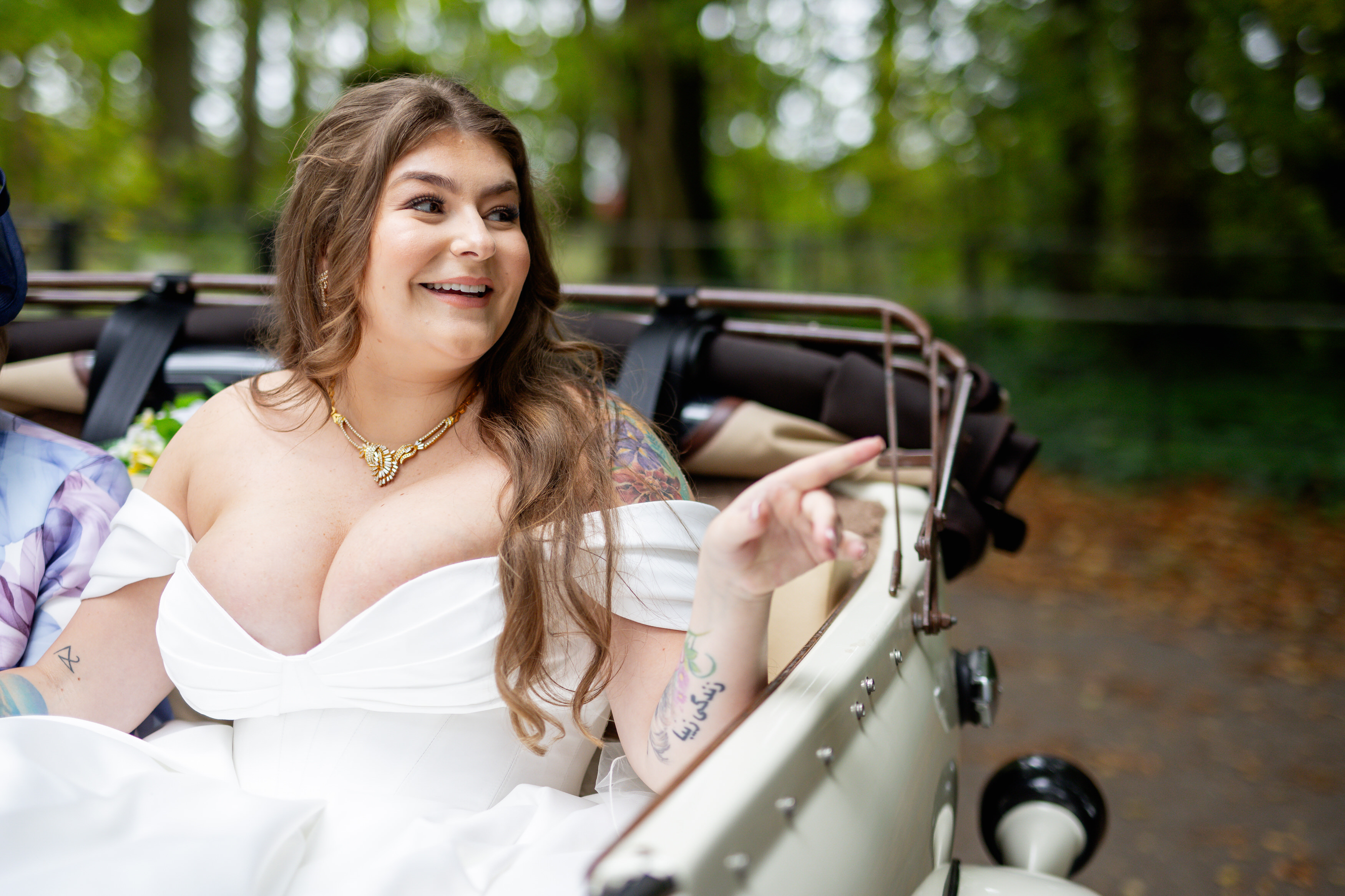 The Bride arrives at the church in the wedding car 
